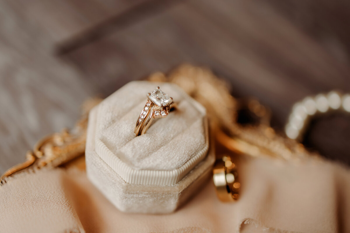 close up detail photo of ring and flowers at a Denver wedding venue 