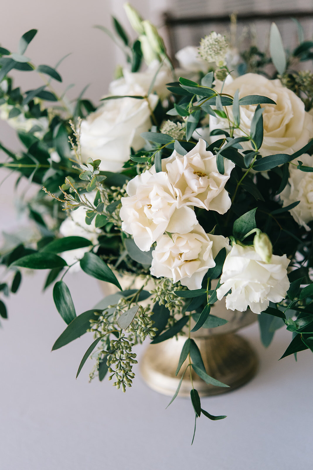 White and green floral arrangements designed by Abby Grace Florals at Saluda SC wedding