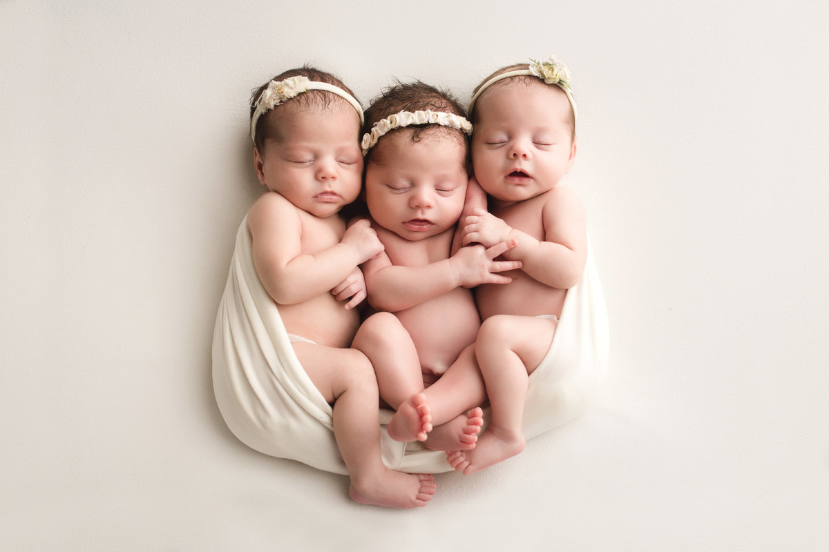 Triplets on a blanket in Springville Al newborn photography studio Trussville Al photographjer