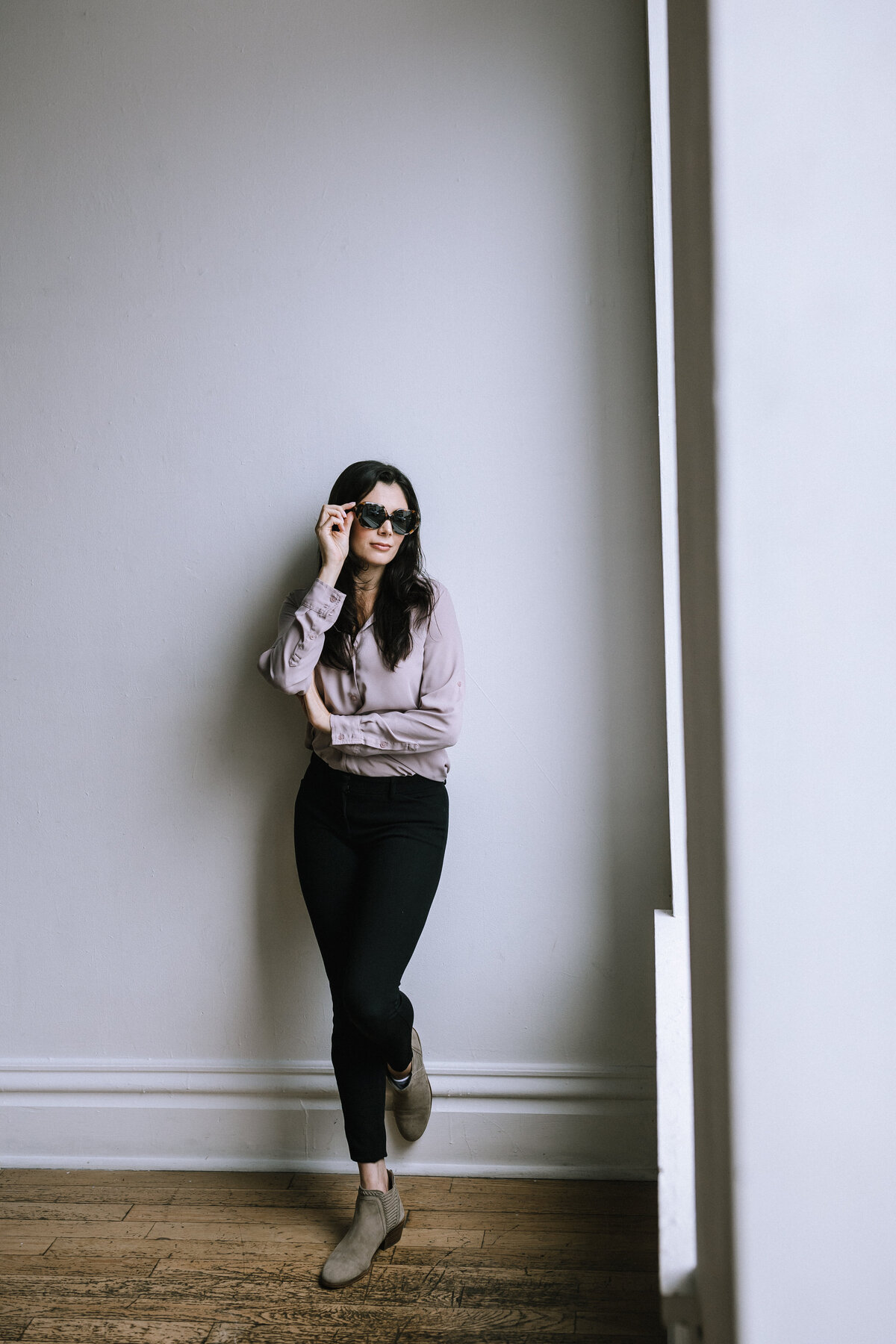 Woman wearing glasses for branding photos for North Point Eyewear of Pittsburgh. 