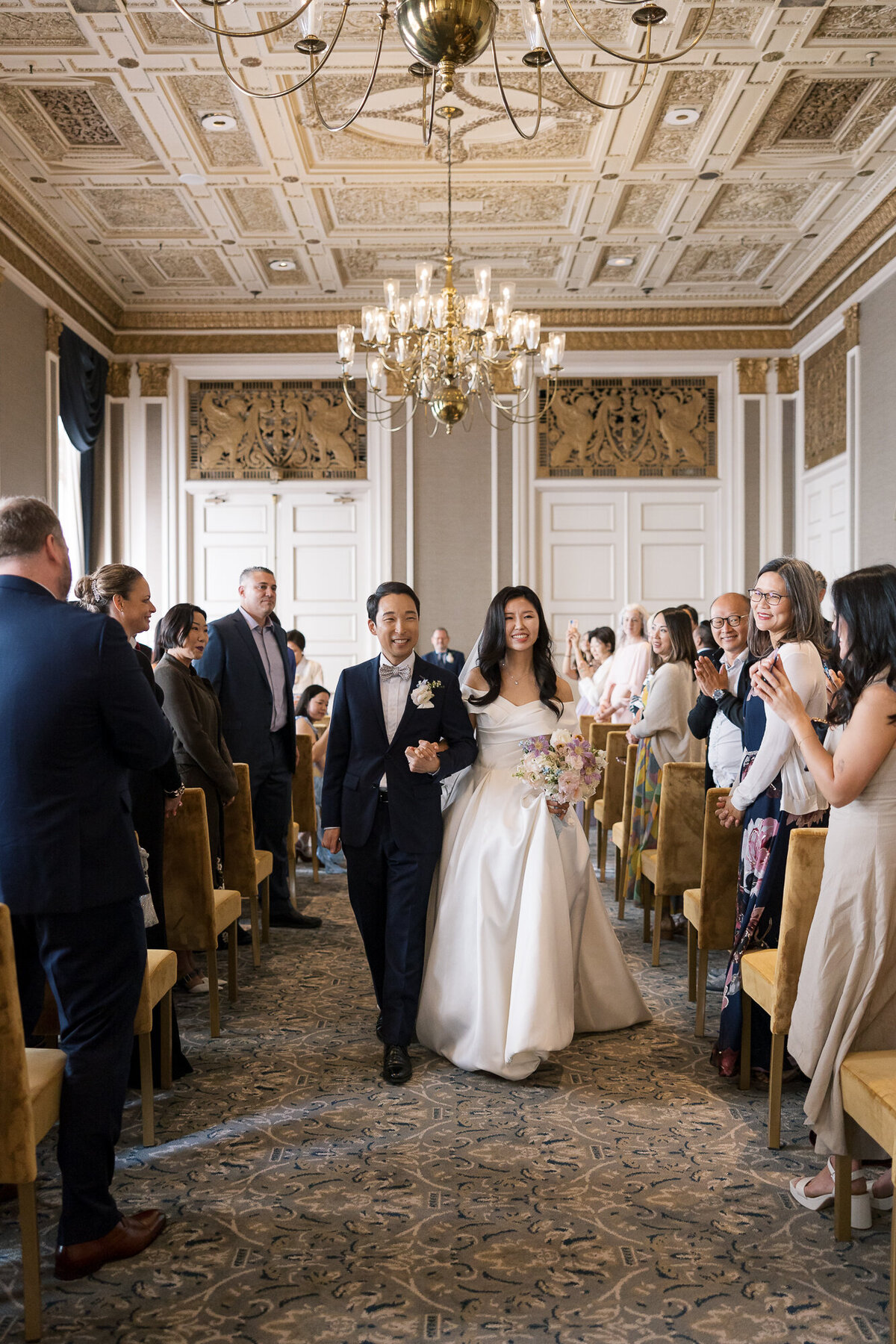 Wedding ceremony kiss Beacon Grand San Francisco downtown venue photography