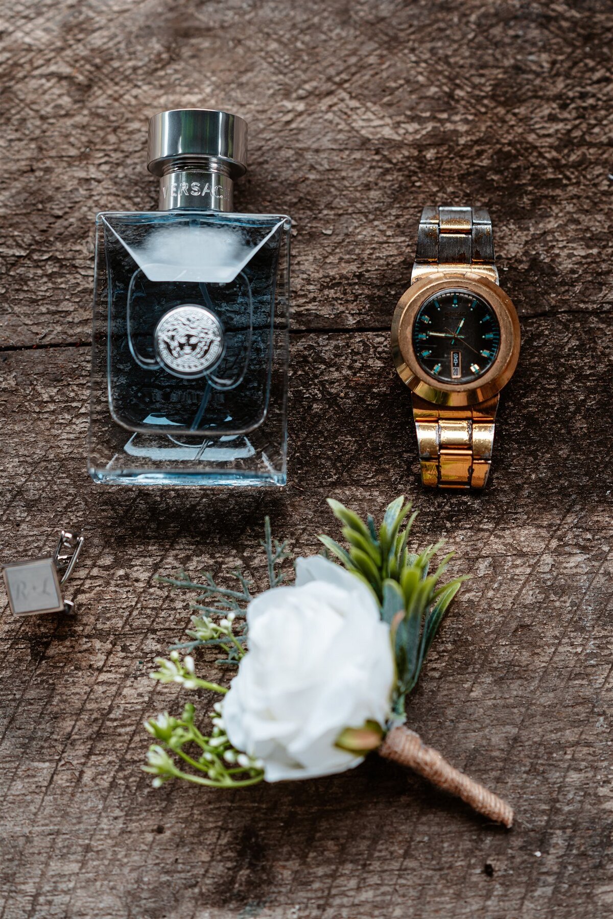 Capture the essence of sophistication and style with our meticulously curated groom's watch, perfume, and attire ensemble – a timeless blend of elegance for your special day.