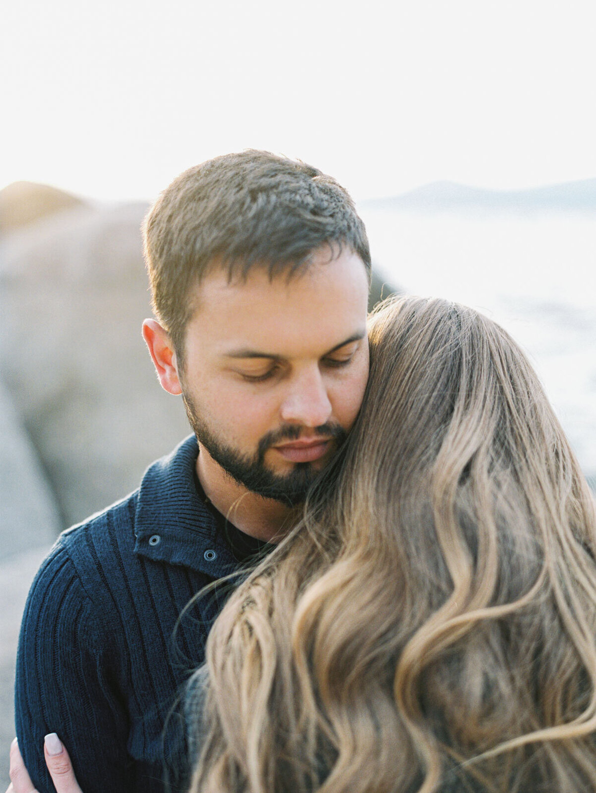 Romantic Engagement on the beach in Lake Tahoe