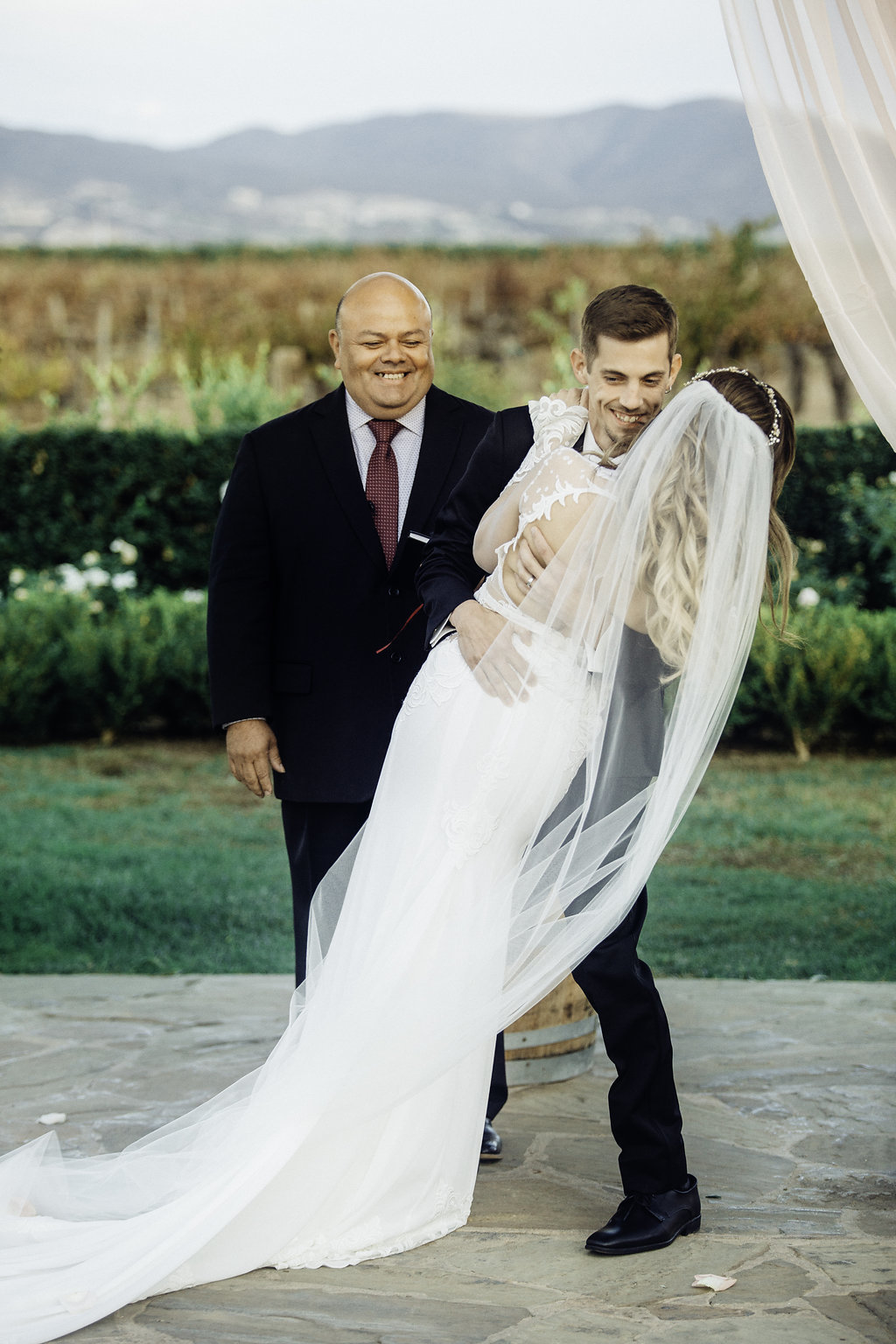 Wedding Photograph Of Bride And Groom Hugging Los Angeles