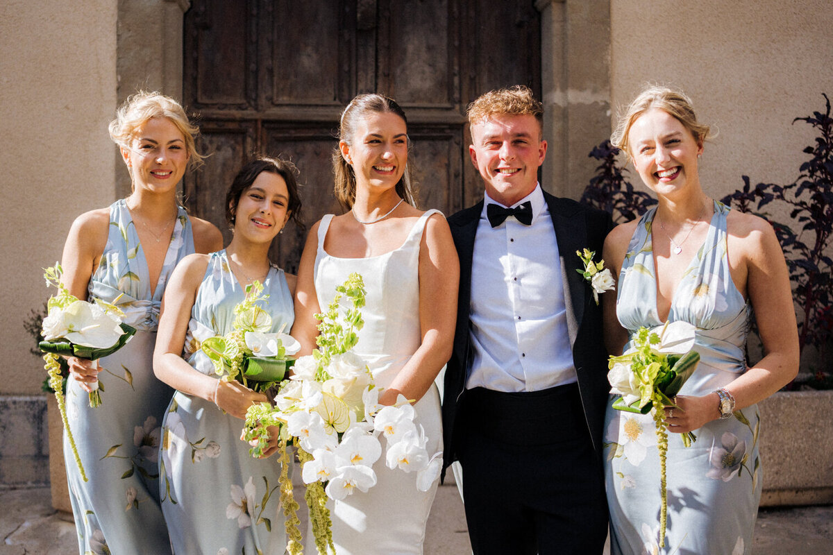 bride-church-exit-white-orchid-wedding-bouquet-france8