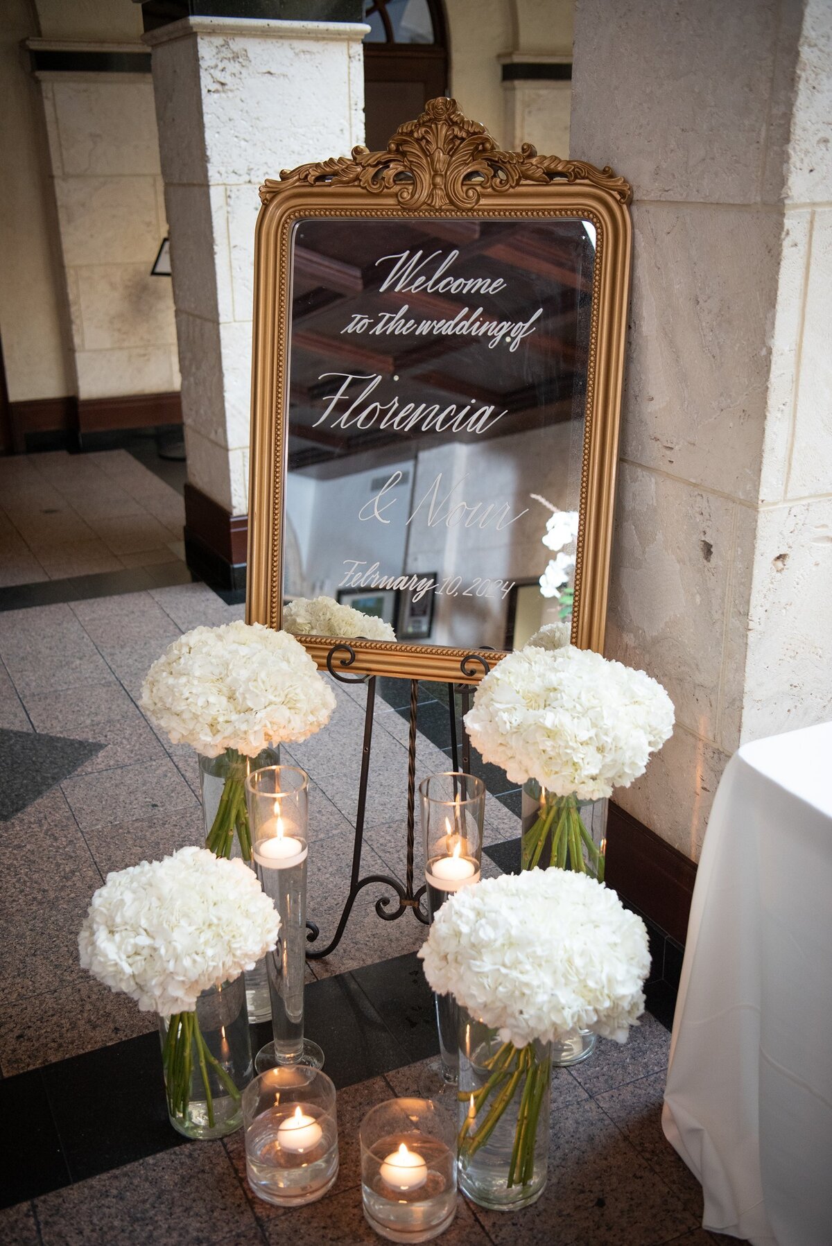 Medium vertical mirror with ornate ornament on top with calligraphy for welcome sign