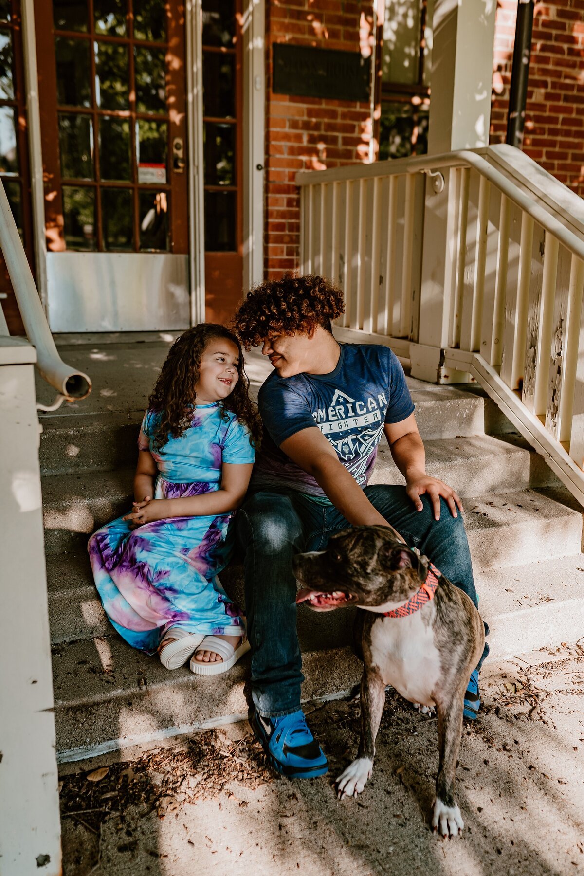 Siblings-and-Dog-on-Porch-Iowa-State-University-Ames-Iowa-Storyteller-Collective-Photo-Co