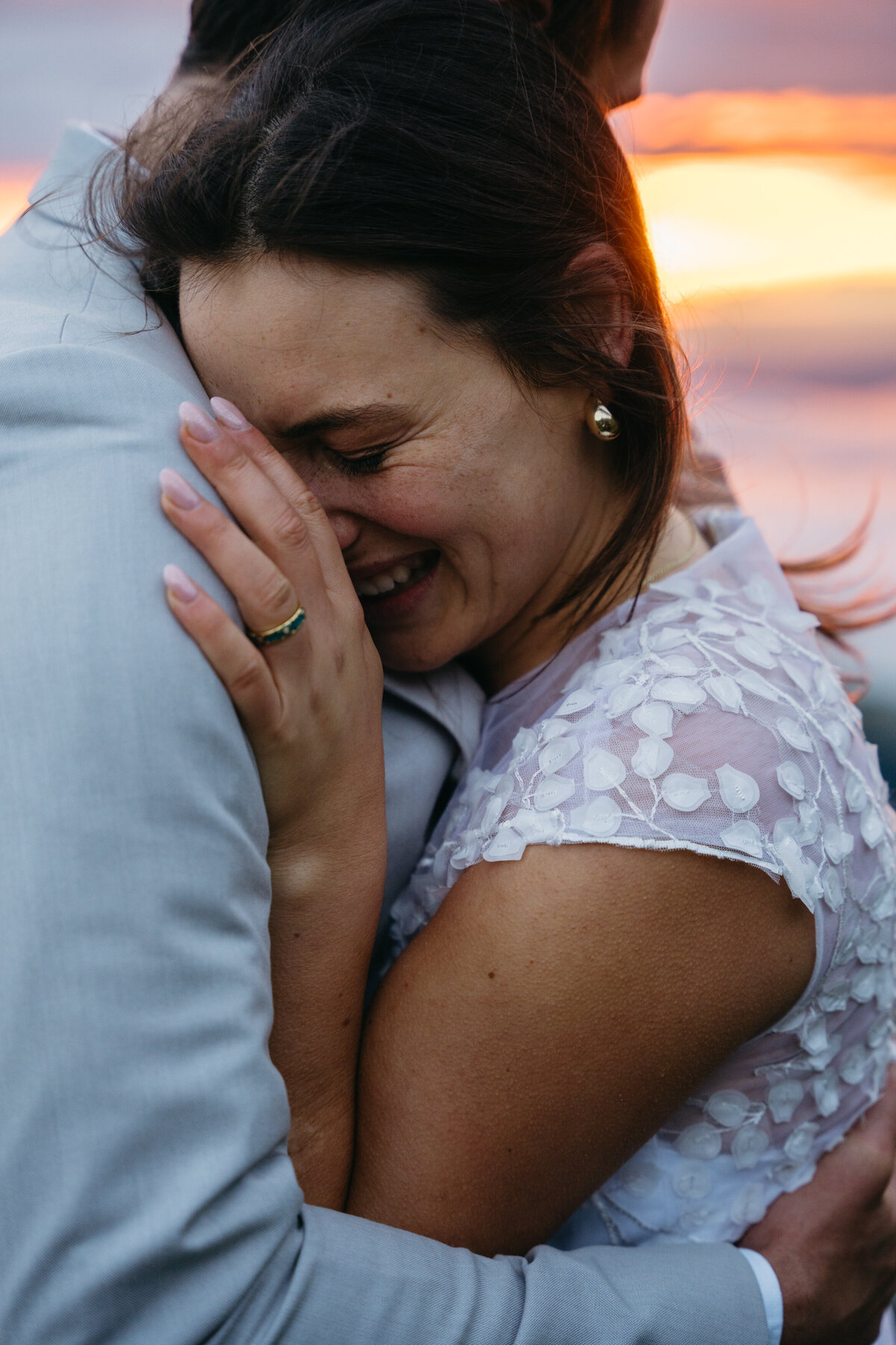 Bride and groom during sunset mountain elopement in Switzerland