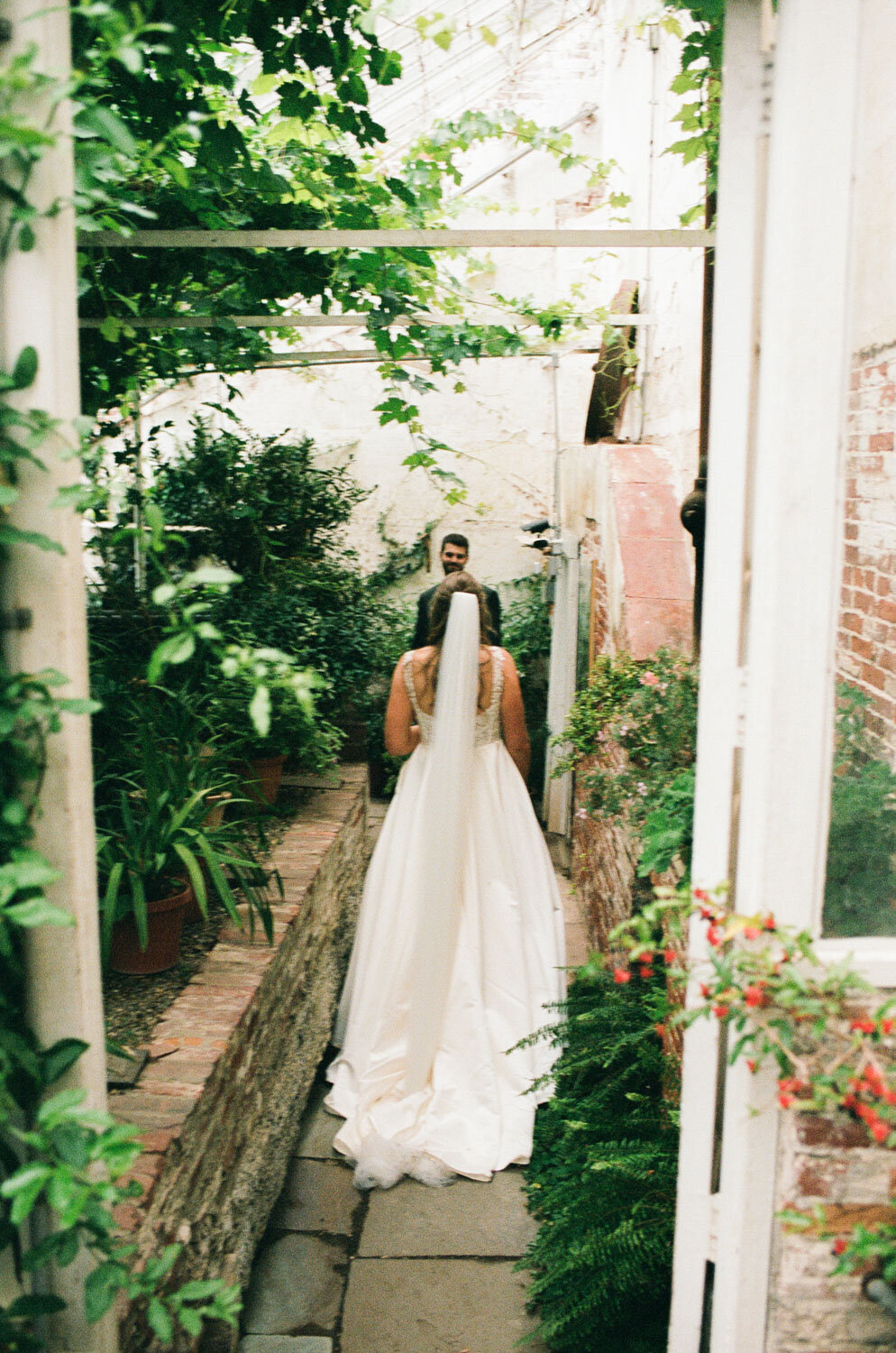 Bride facing her groom for a first look