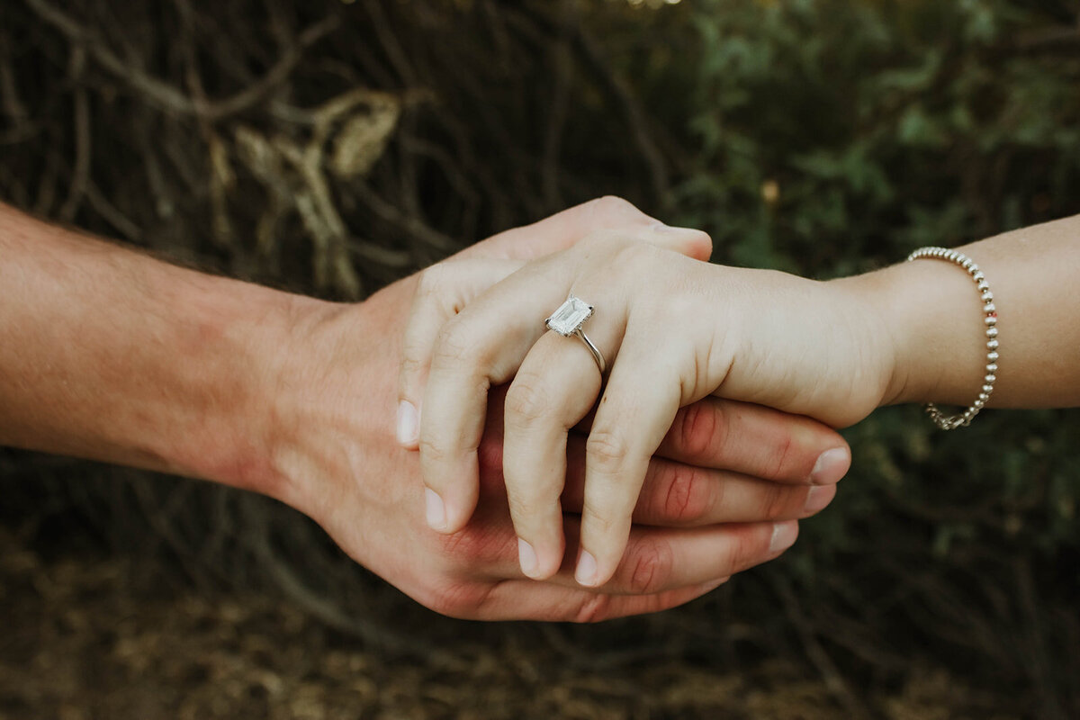 holding hands with ring