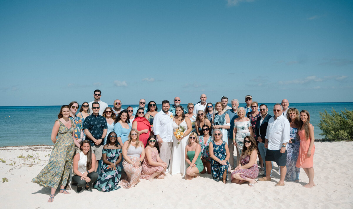 wedding party and guests on the beach in Cozumel