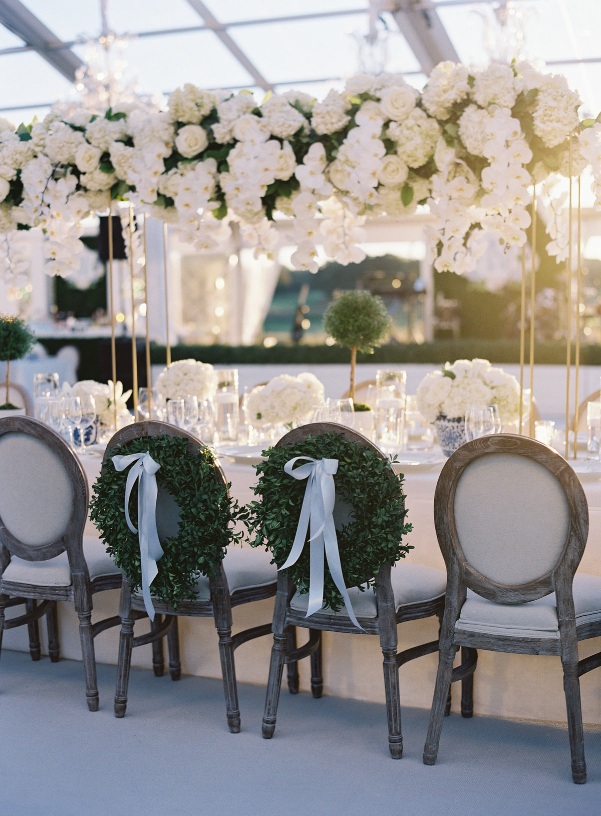 Close up of the bridal chairs at the wedding reception. 