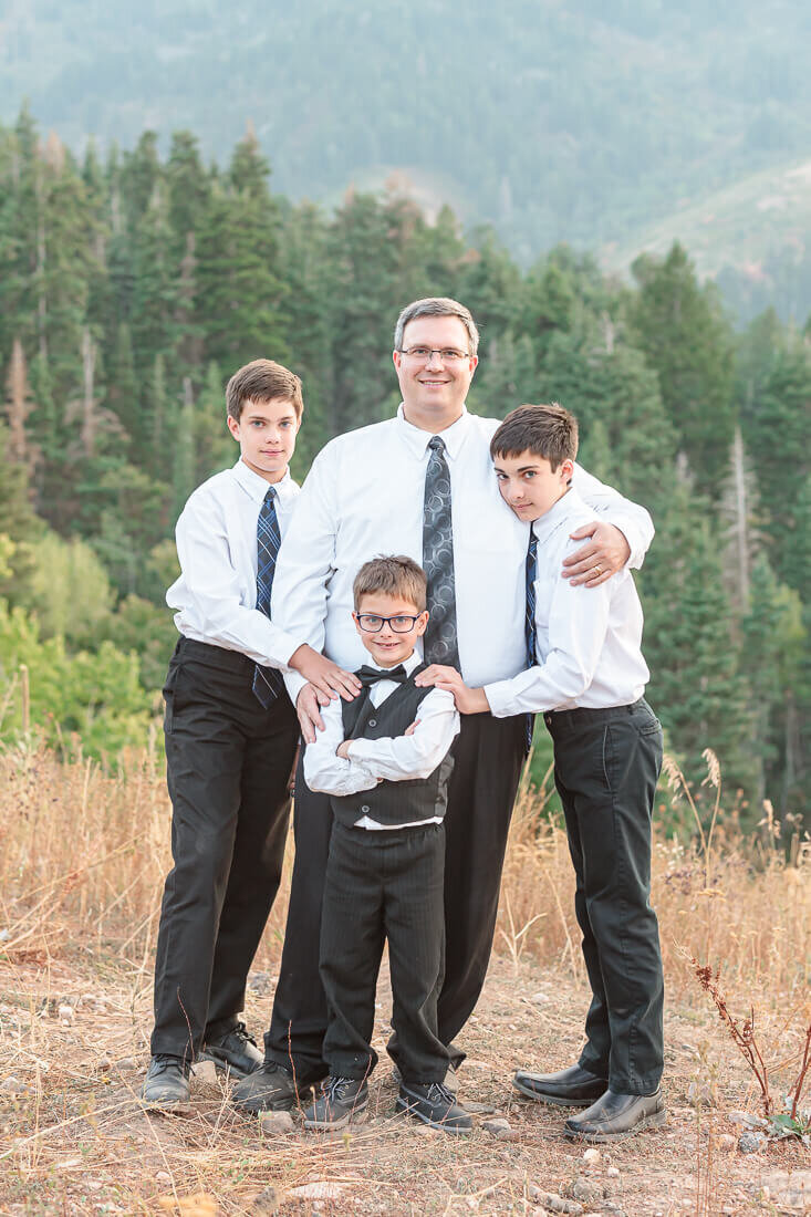 Joseph and his three sons at Snow Basin in the fall