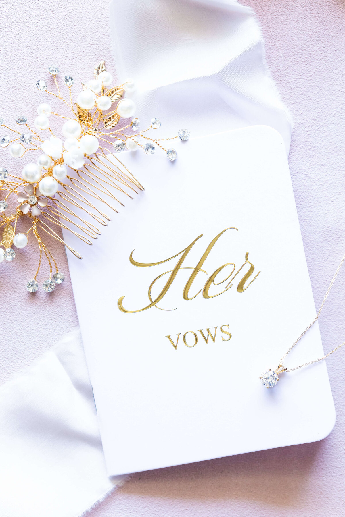 Her vow books and wedding jewelry