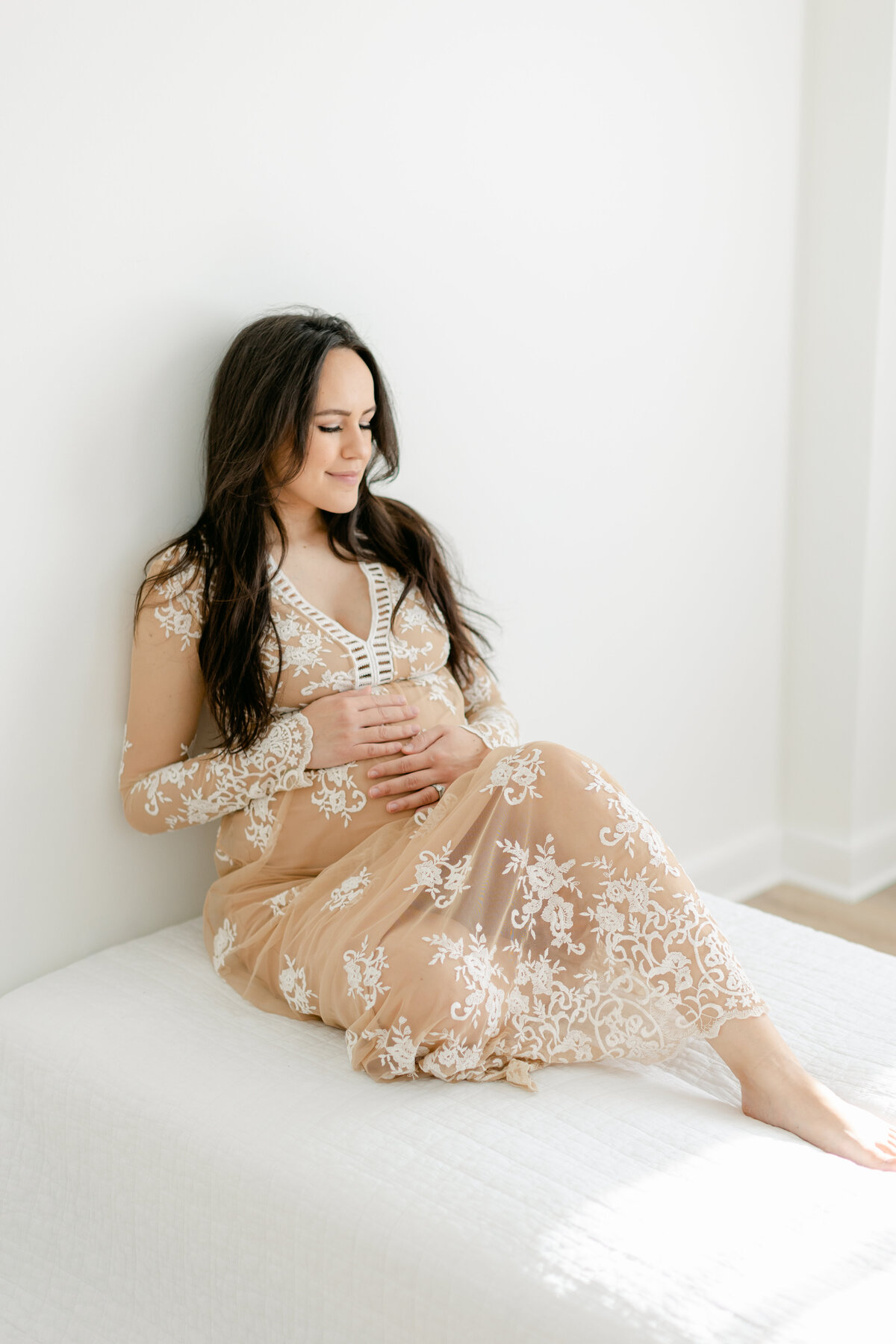 pregnant mom wearing lace dress photographed by Philadelphia Maternity Photographer
