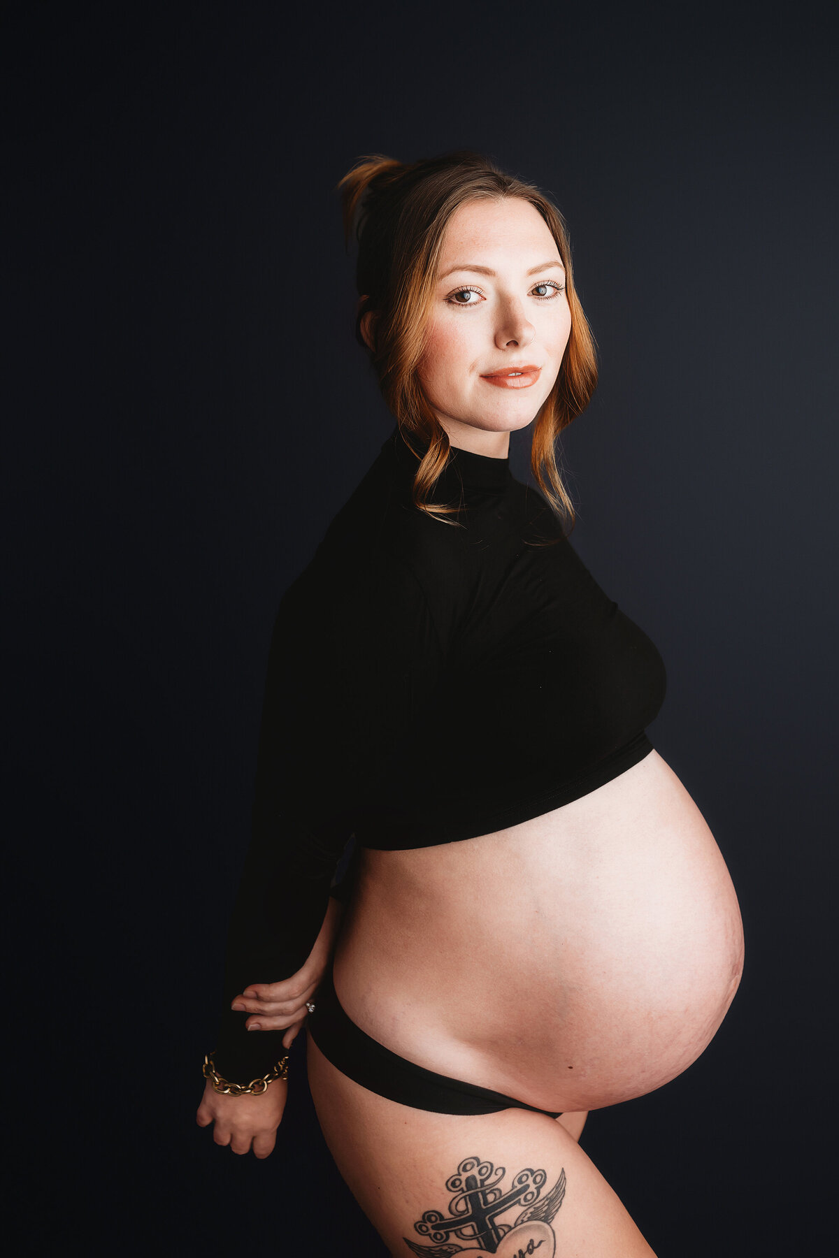 Pregnant mother poses for Maternity Portraits in Charleston, SC. 