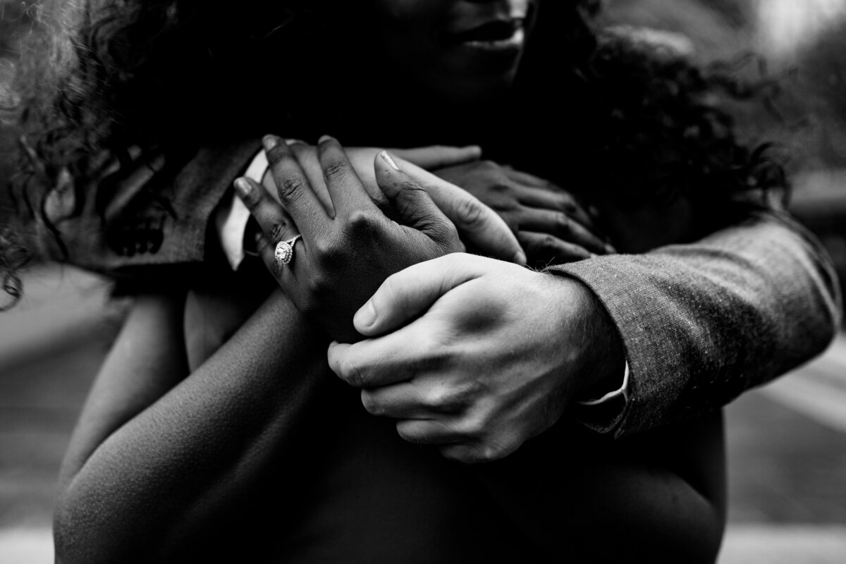 A photo of a couples hands during their engagement photos in Toledo Ohio.  Photo By Adore Wedding Photography. Toledo Wedding Photographers