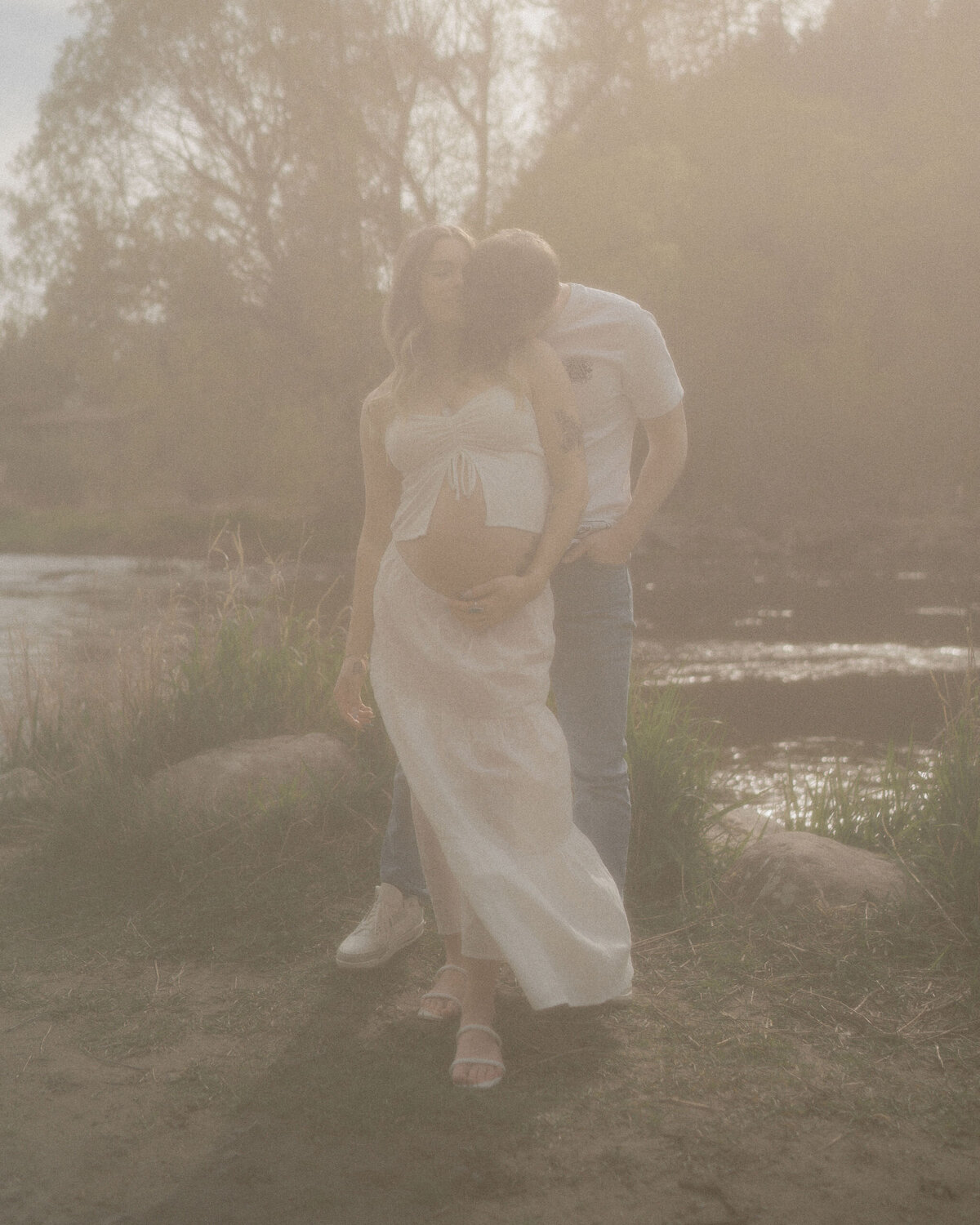 Documentary-style maternity photography in Spokane WA with soft light and texture.