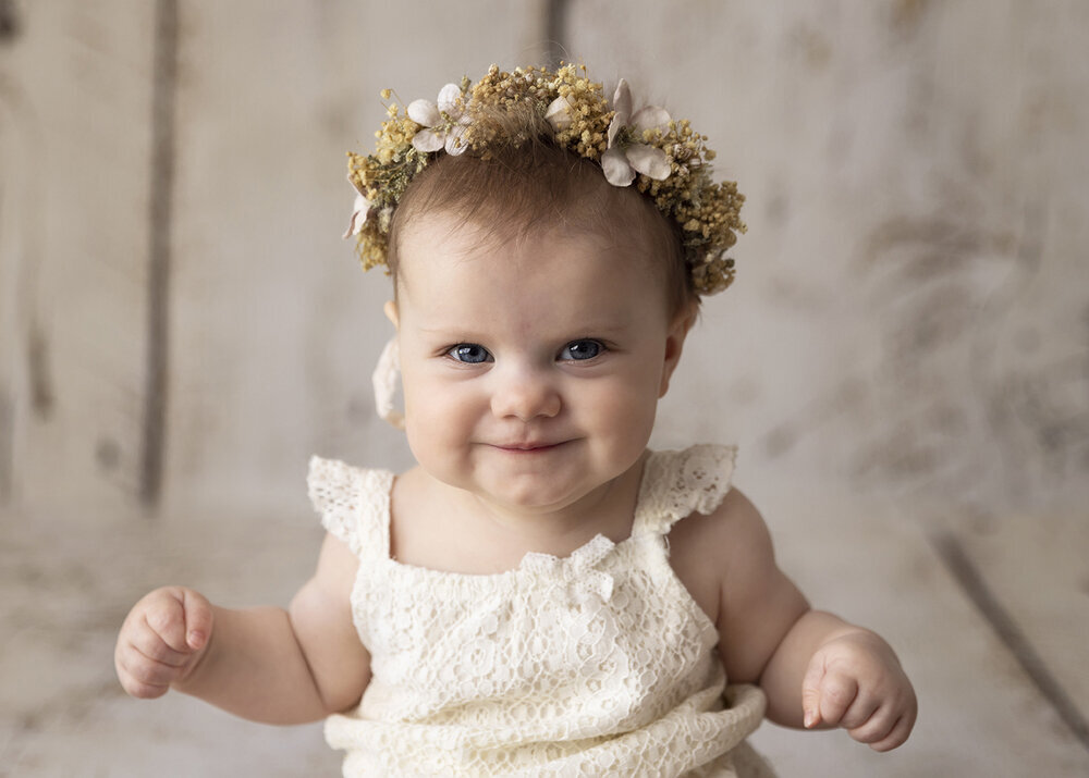 MILESTONE_SITTER_BABYGIRLSMILINGWITHFLORALHALO