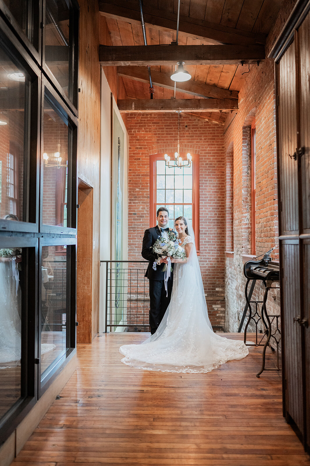 bride and groom enjoy romatic indoor portraits at city winery