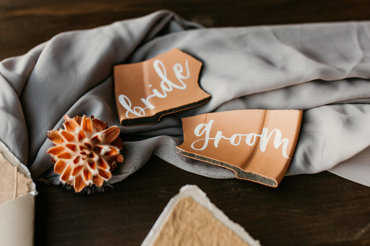 calligraphy on terracotta for bride and groom
