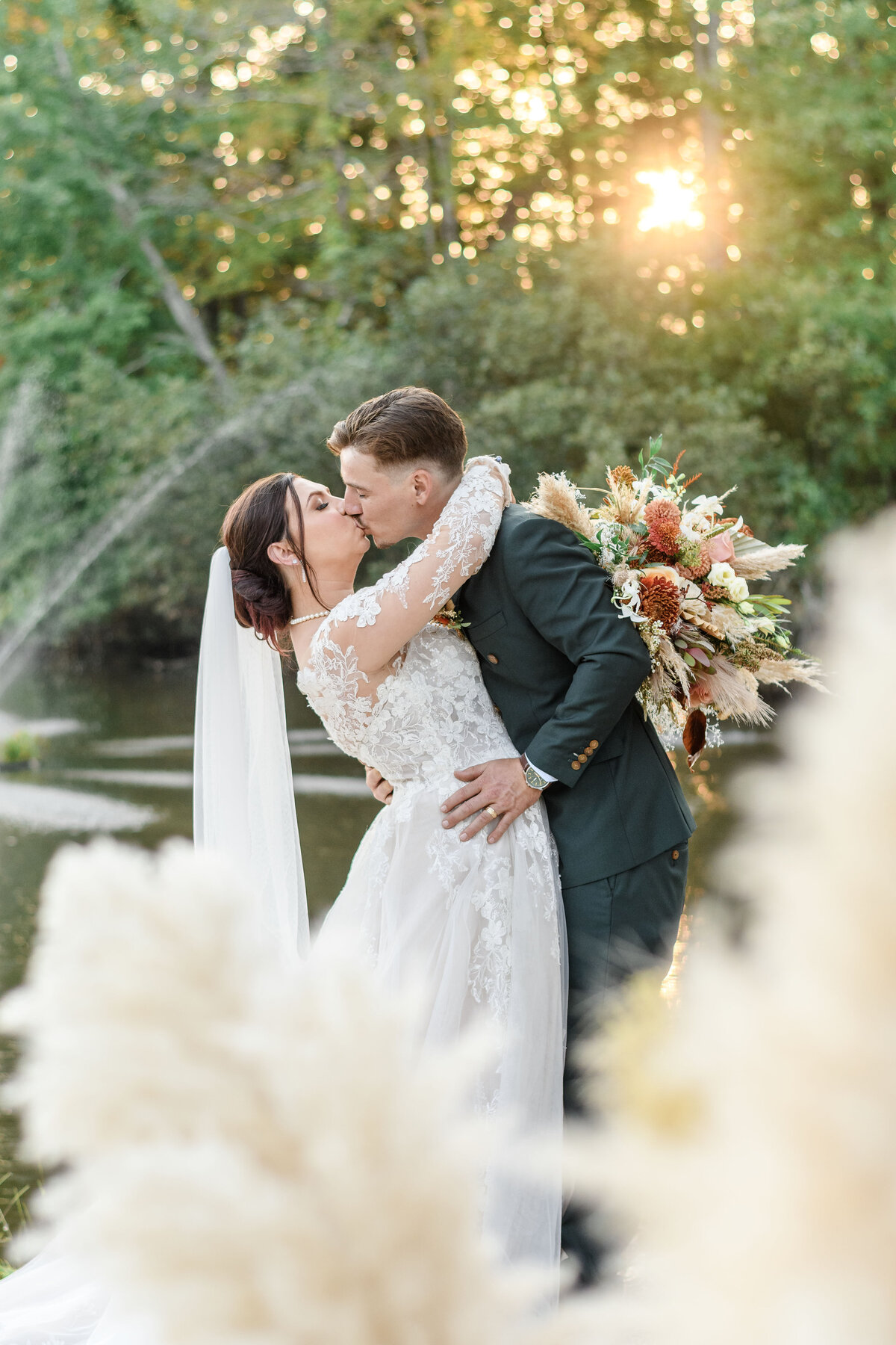 Ashley Hall Photography Couple Sharing a Golden Hour Kiss