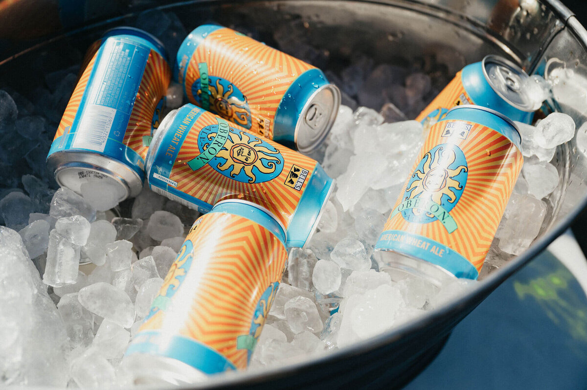 Beers in a cooler at outdoor wedding near Boise.