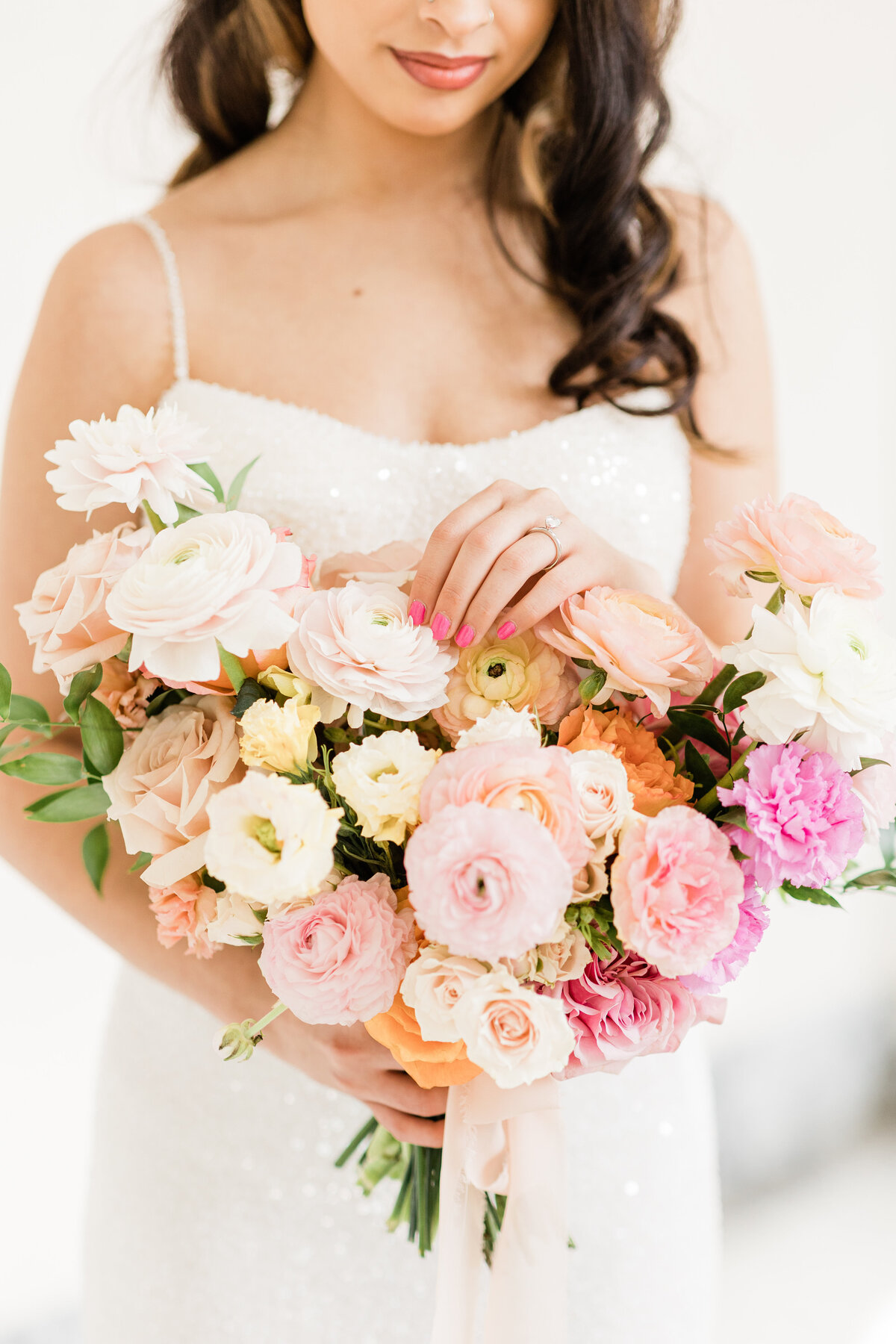 luxury-wedding-bride-holding-bouquet-riverside-place-spokane.jpeg