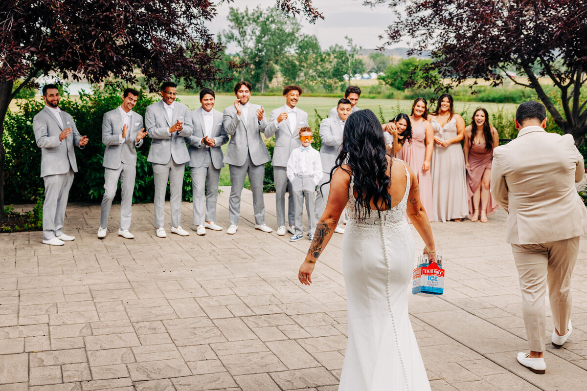 Montana bride and groom having first look with their wedding party