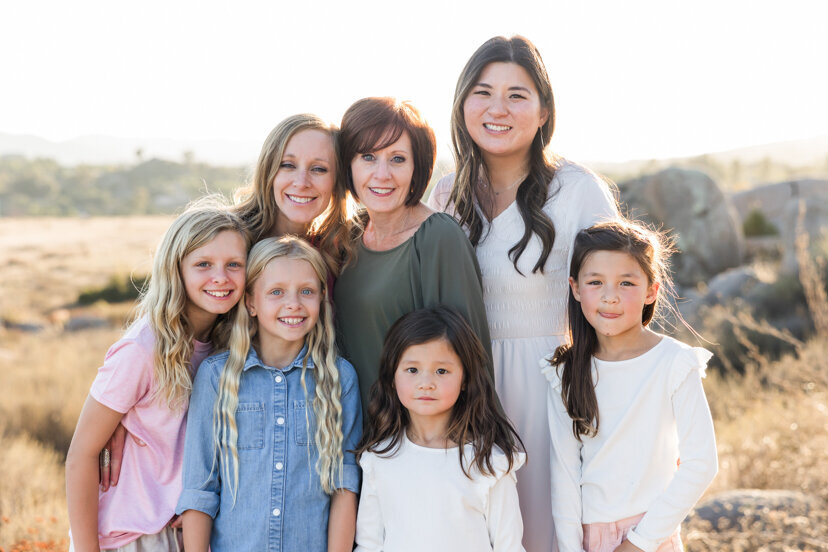 family-of-women-family-of-four-sitting-on-rock-wrights-field-san-diego