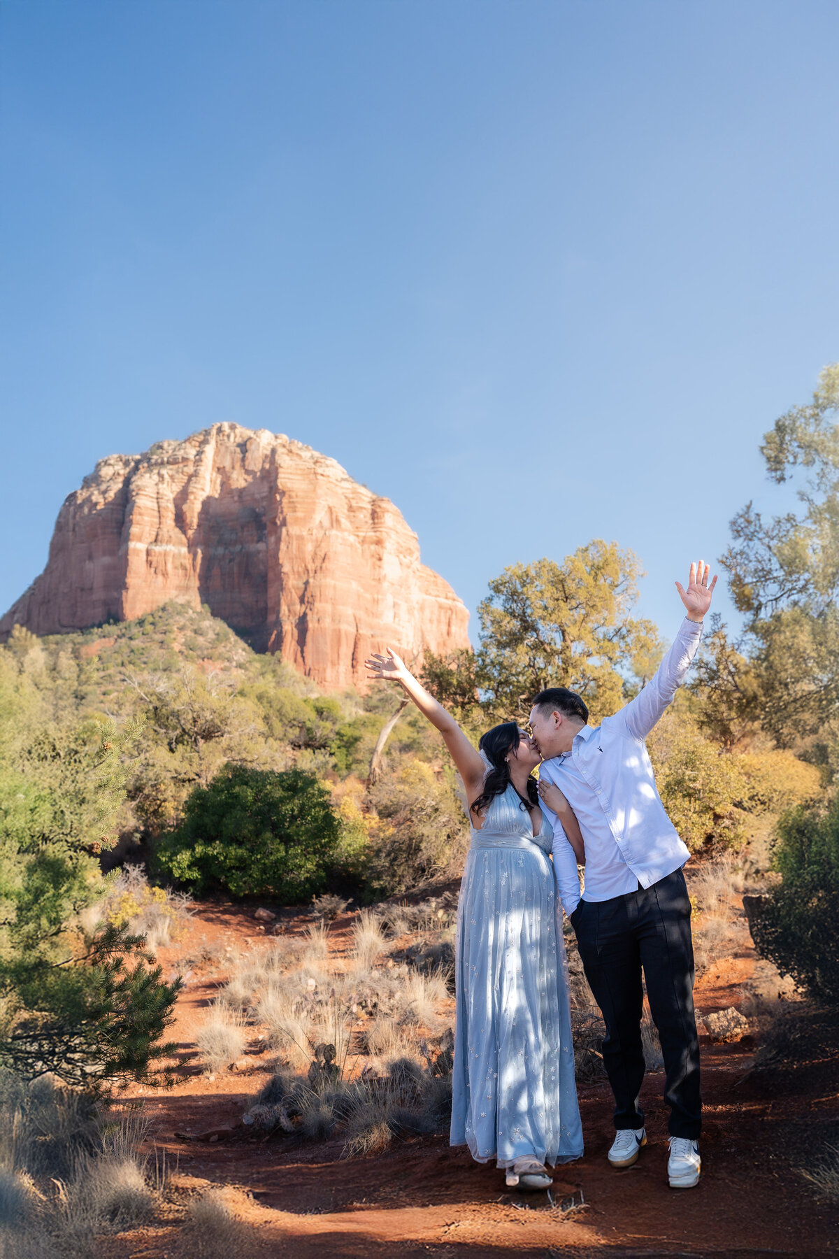 Bell Rock Sedona Arizona Elopement with Asian couple celebrating.