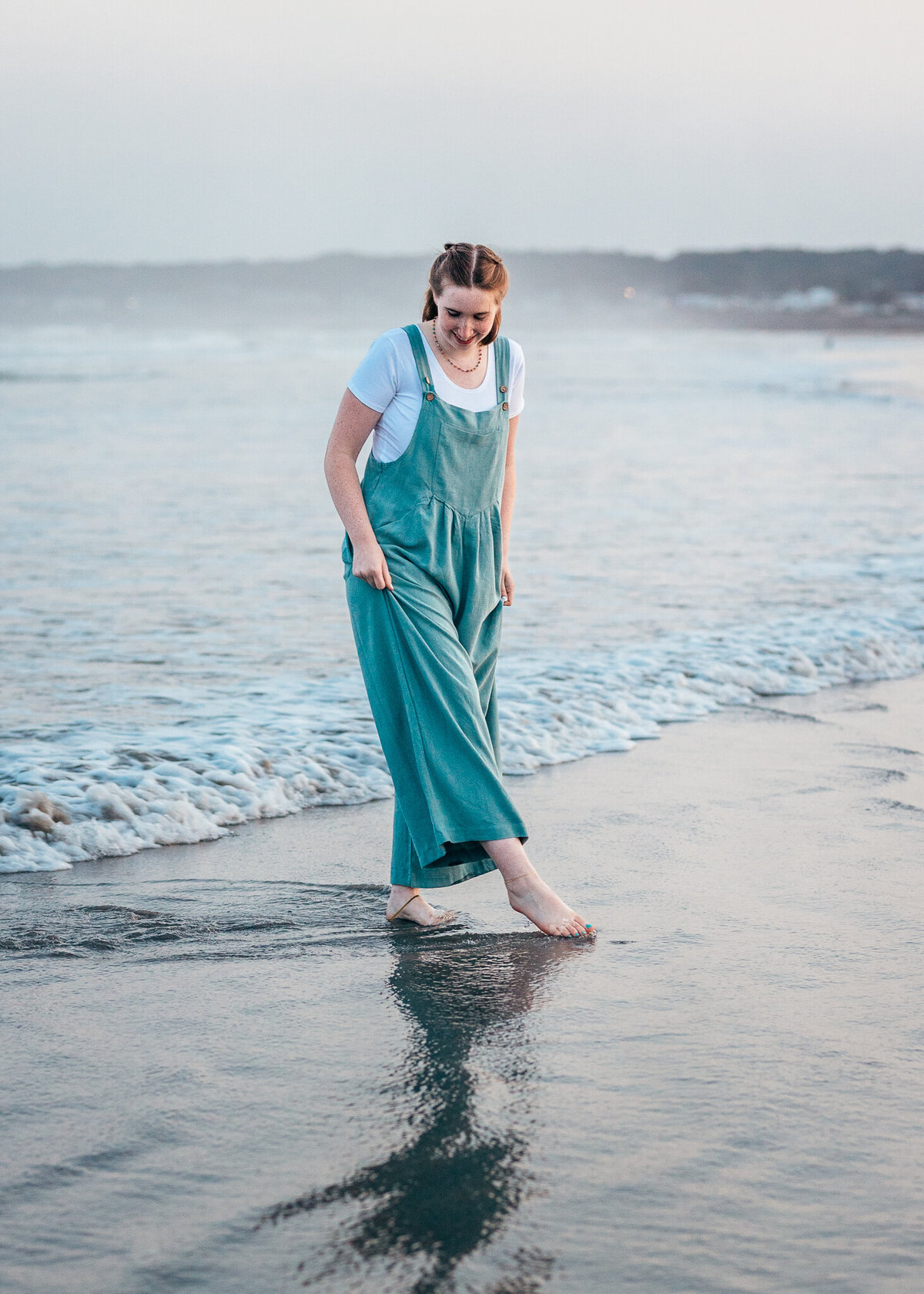 Concord high school senior dipping her toes in the ocean in York ME by Lisa Smith Photography