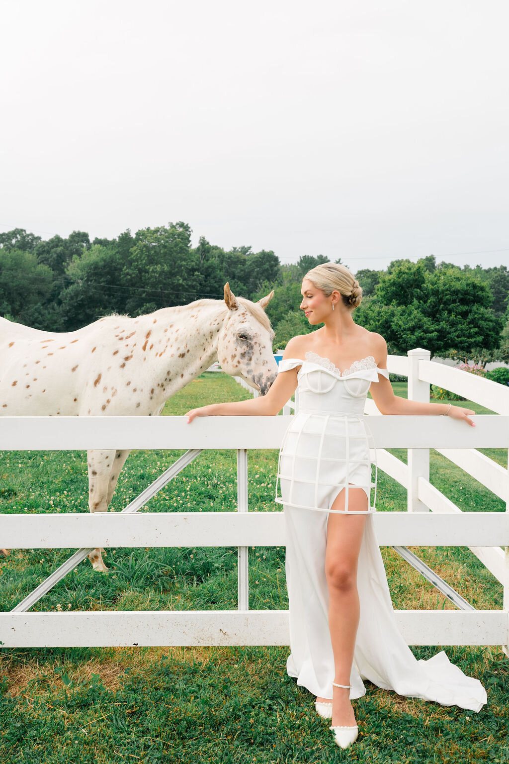 Romantic wedding gown featuring detachable sleeves and elegant veil
