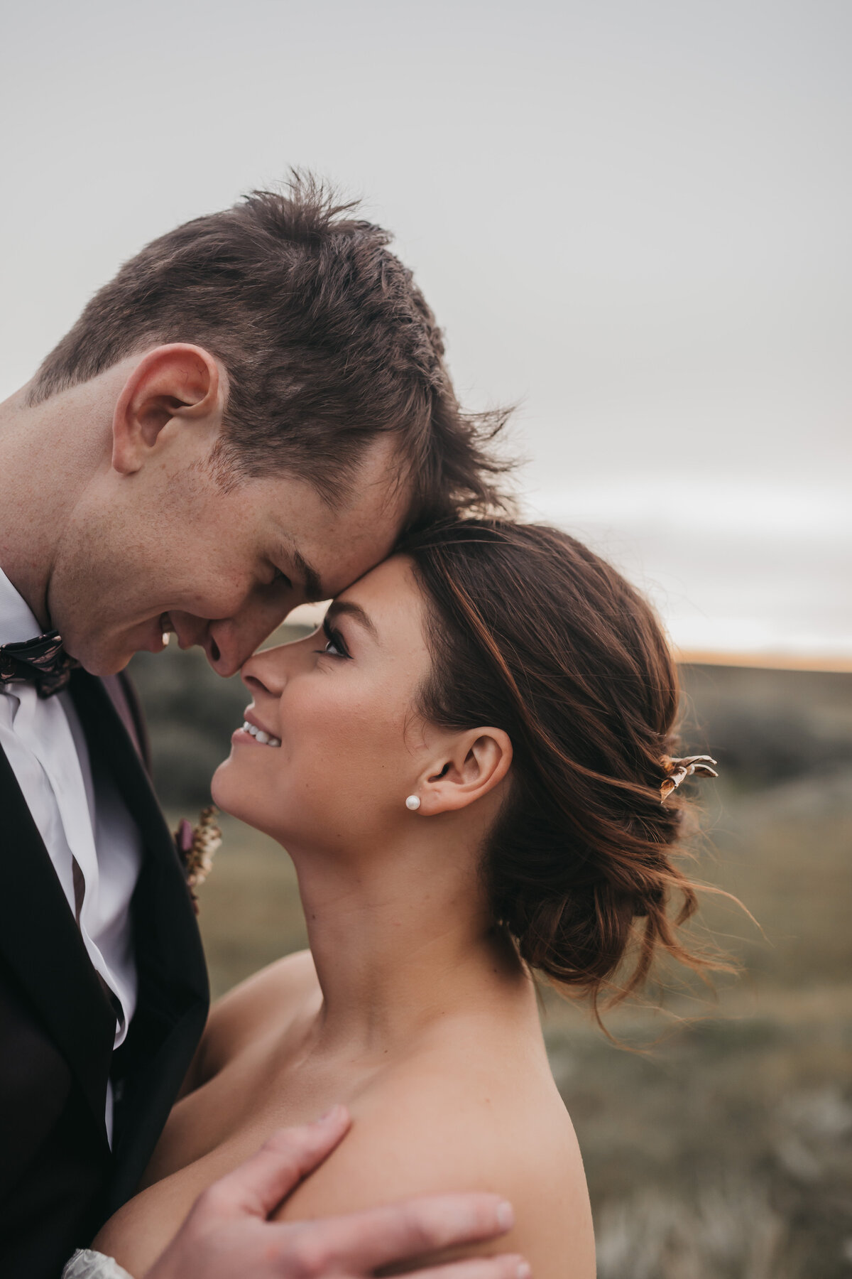 Stunning bridal hair and makeup by Madi Leigh Artistry, experienced and inclusive Calgary hair & makeup artist, featured on the Brontë Bride Vendor Guide.