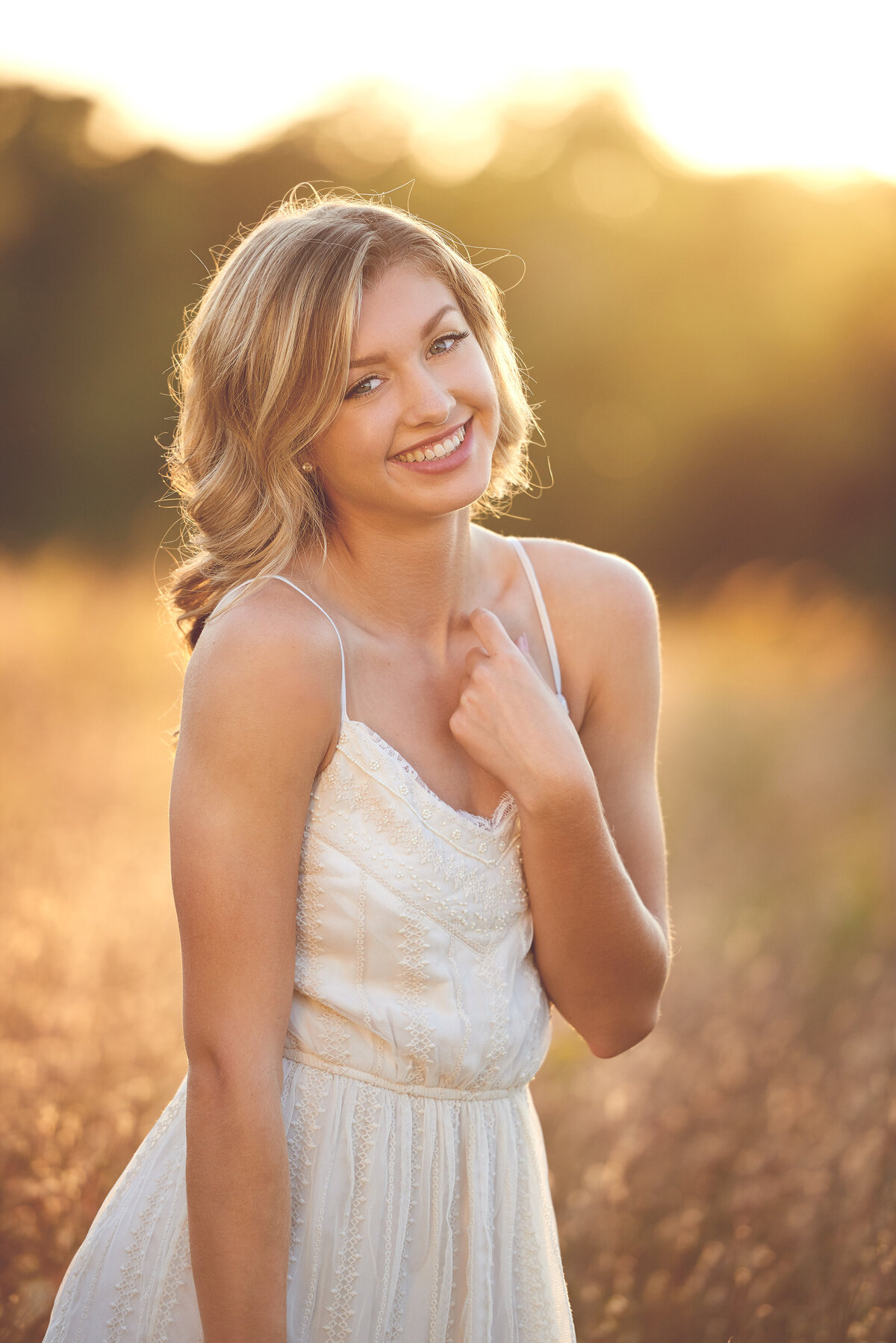 bright senior photos in wheat fields6