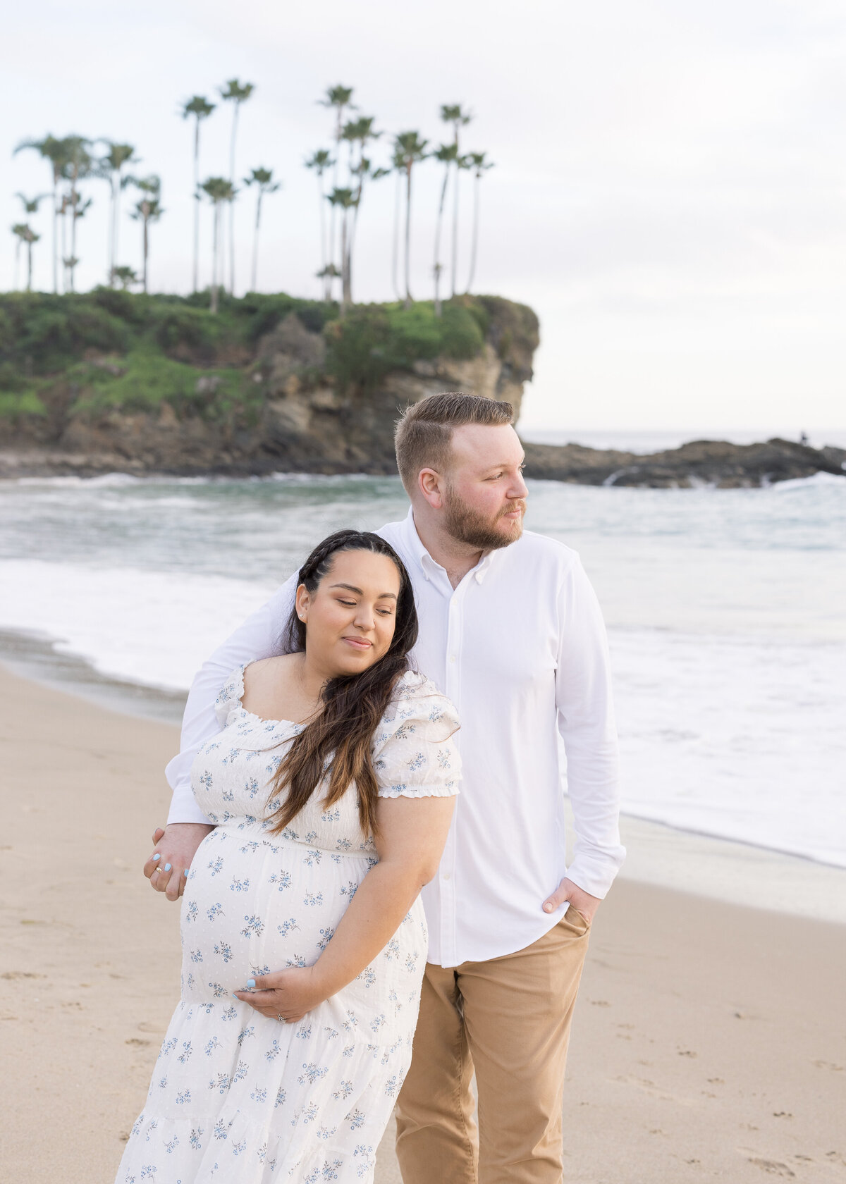 moody maternity photo on the beach