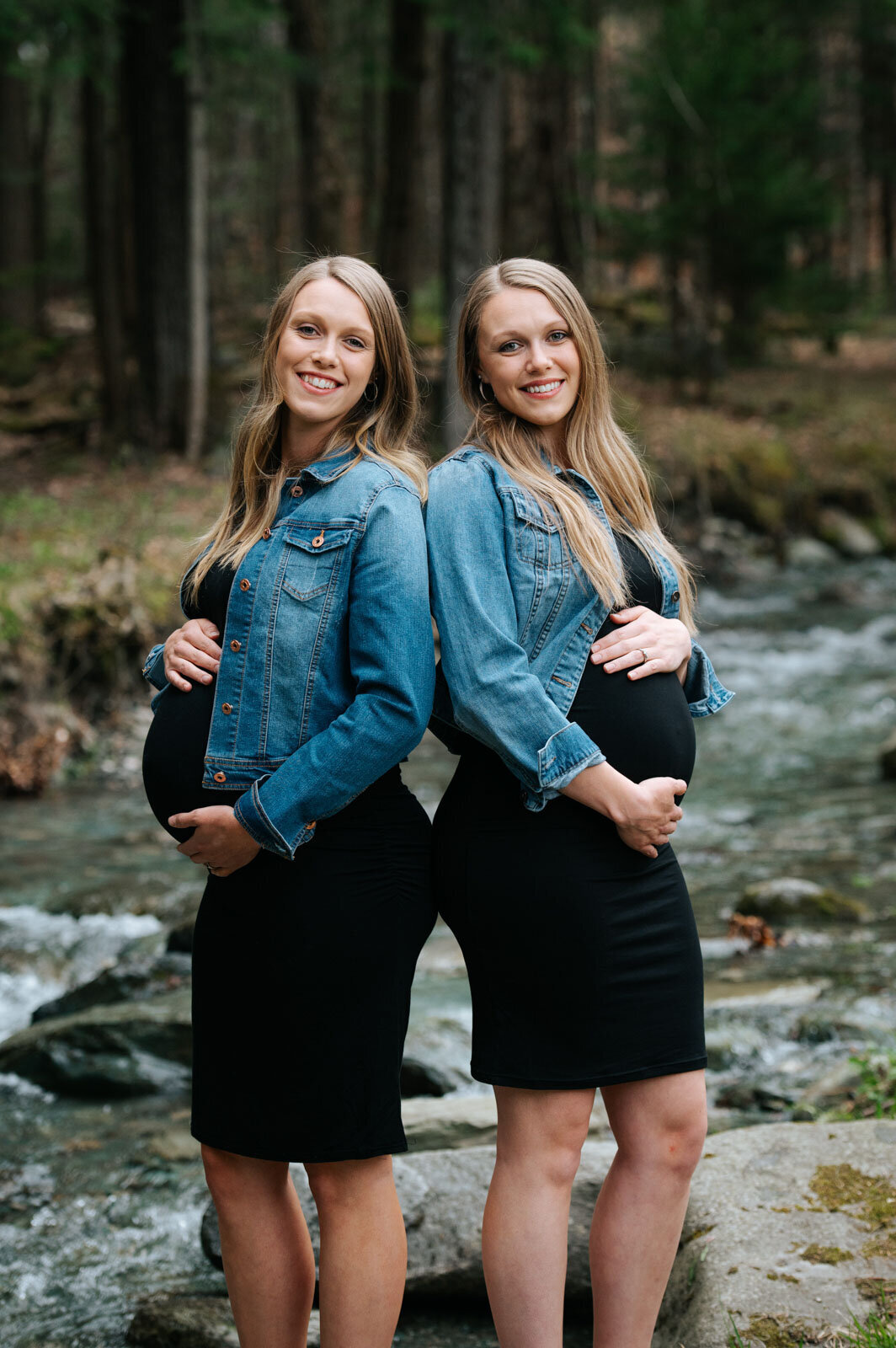 twin sisters pregnant maternity in river jean jacket