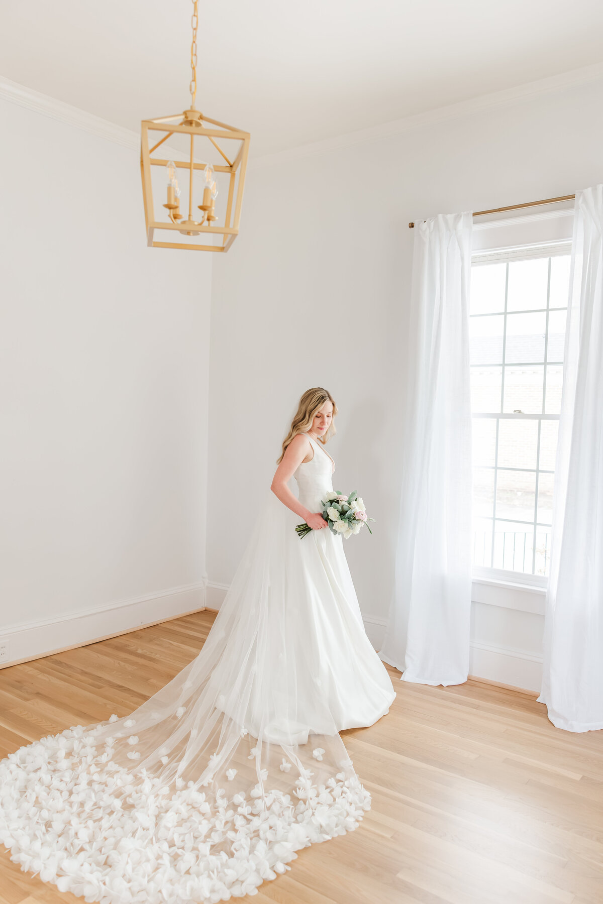 a beautiful portrait of a bride in her wedding dress