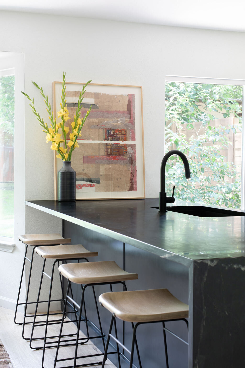 hello-home-austin-black-scandinavian-kitchen-waterfall-peninsula-black-cabinets-8