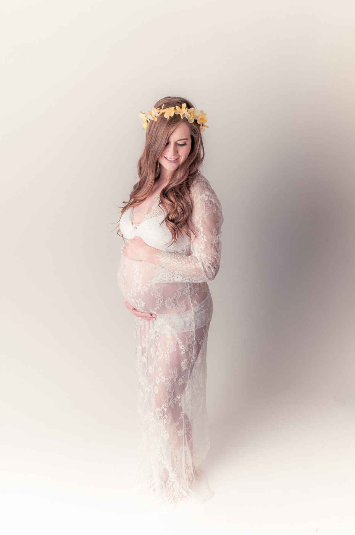 Woman poses for maternity photoshoot in Southern California | One Shot Beyond Photography