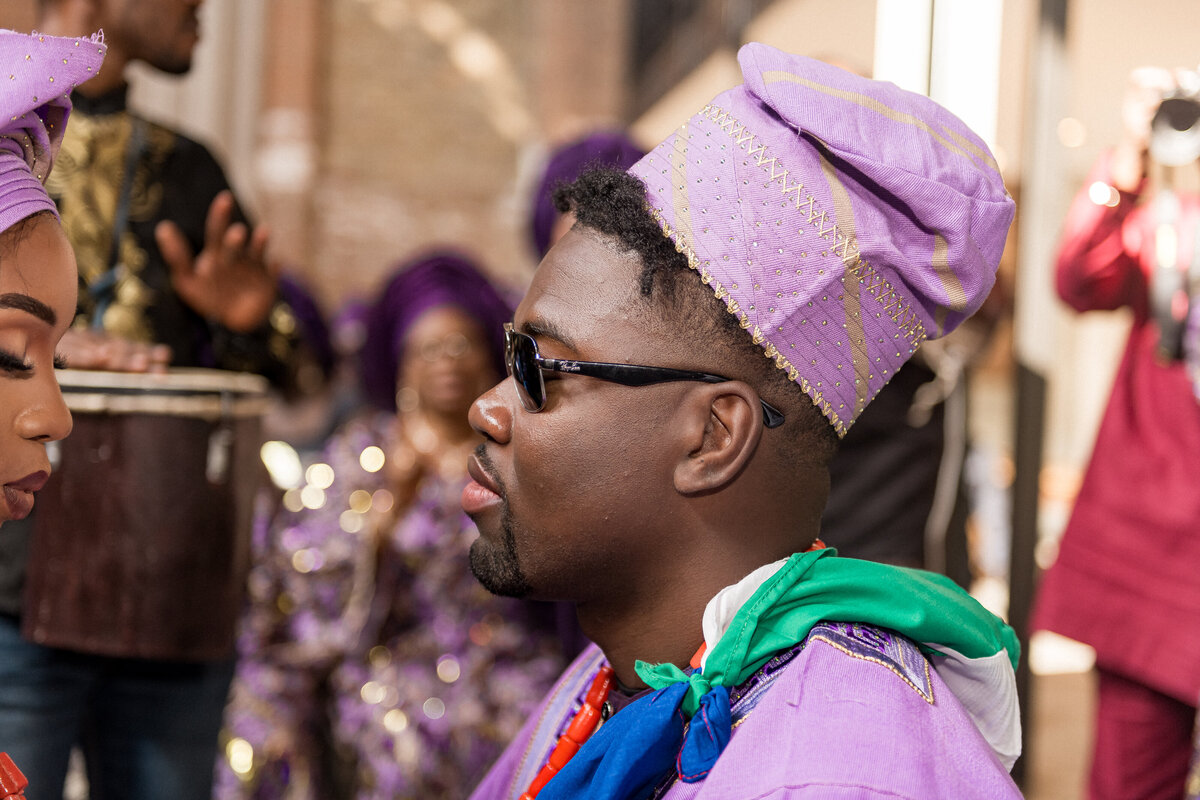 Wedding ceremony arch with lush floral decorations