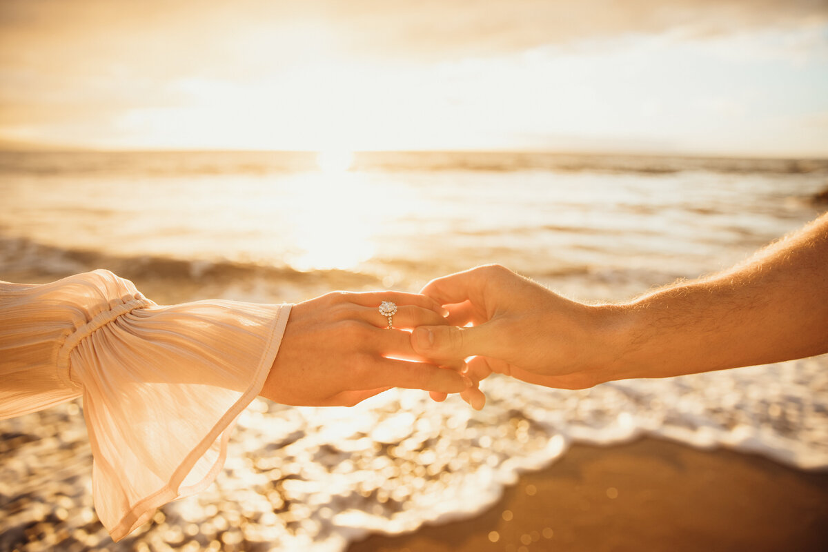 Hawaii Engagement Photographer captures close up of hands during beach engagement photos