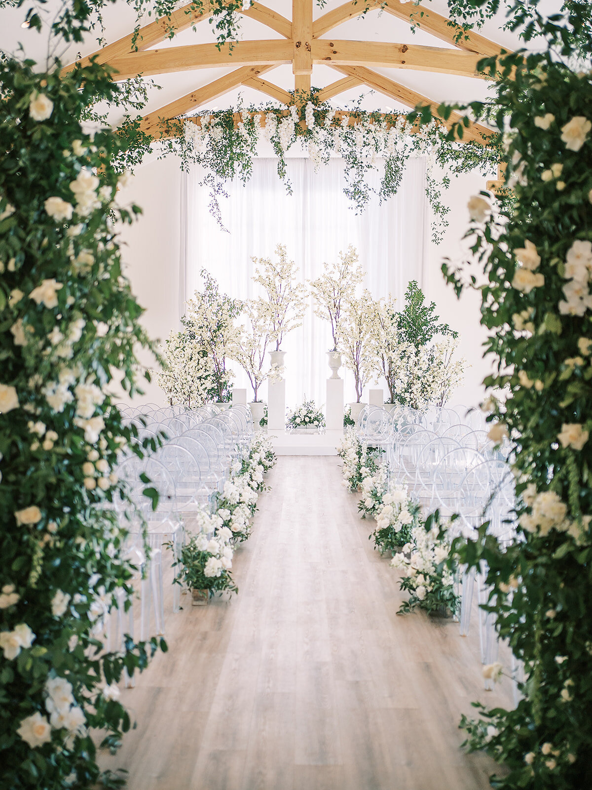 Extravagant flowers fill the chapel of The Arlo in Austin, Texas for a wedding