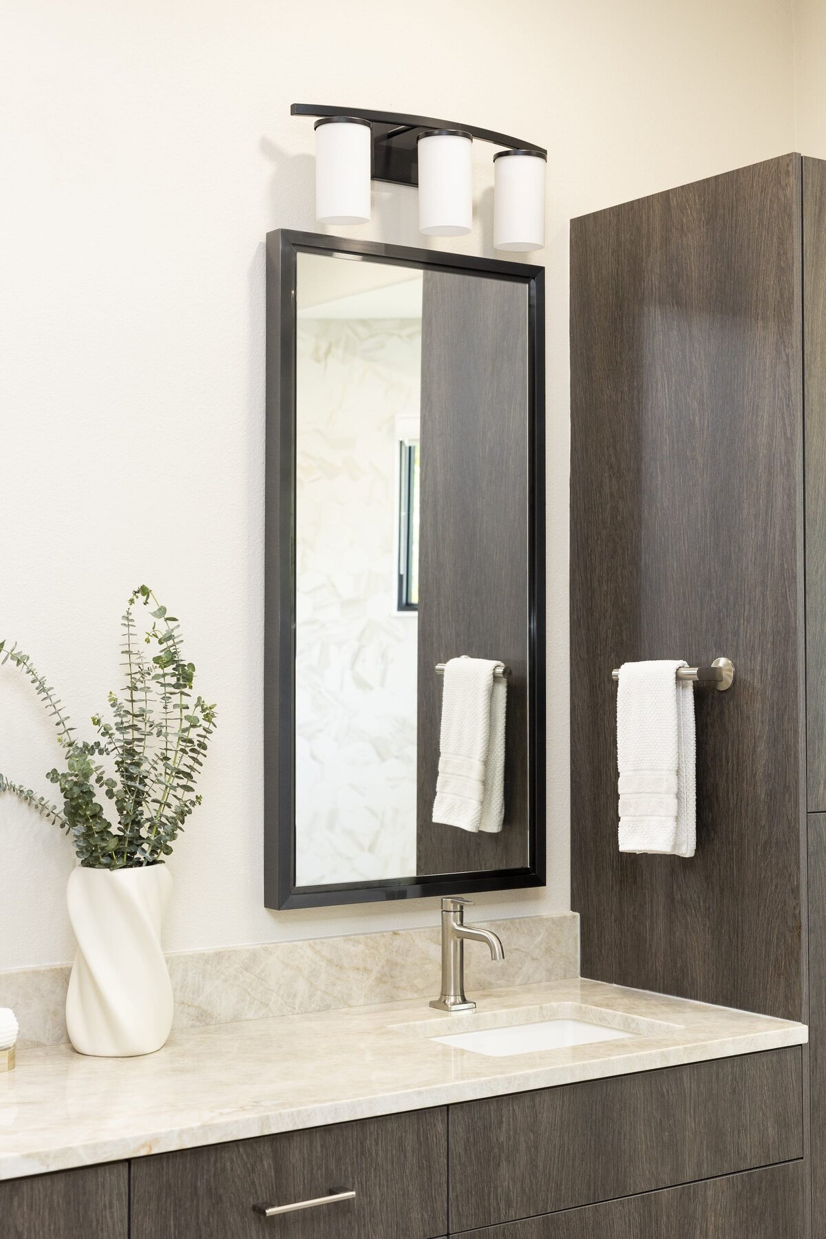 dewine design orlando interior designer windermere full home renovation bathroom black trimmed square mirror with dark cabinets