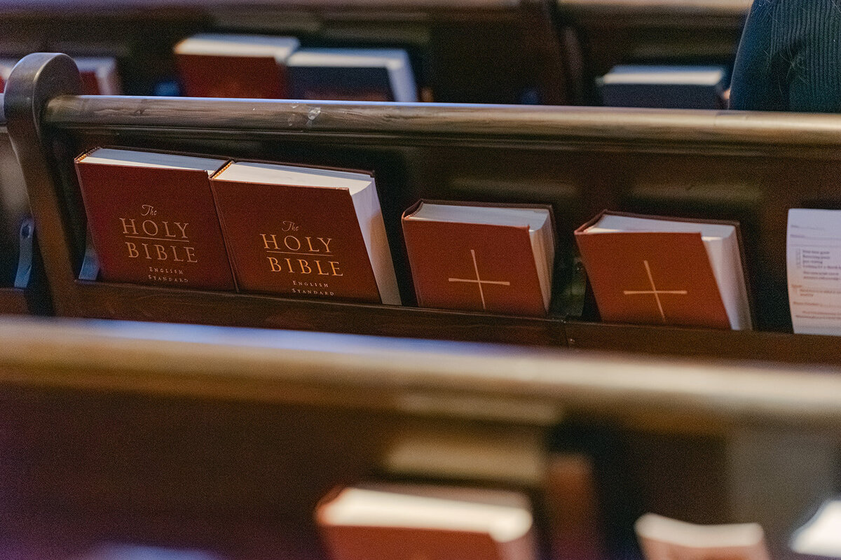 Fine art image of wedding pews and bibles awaiting guests at San Antonio religious wedding venue
