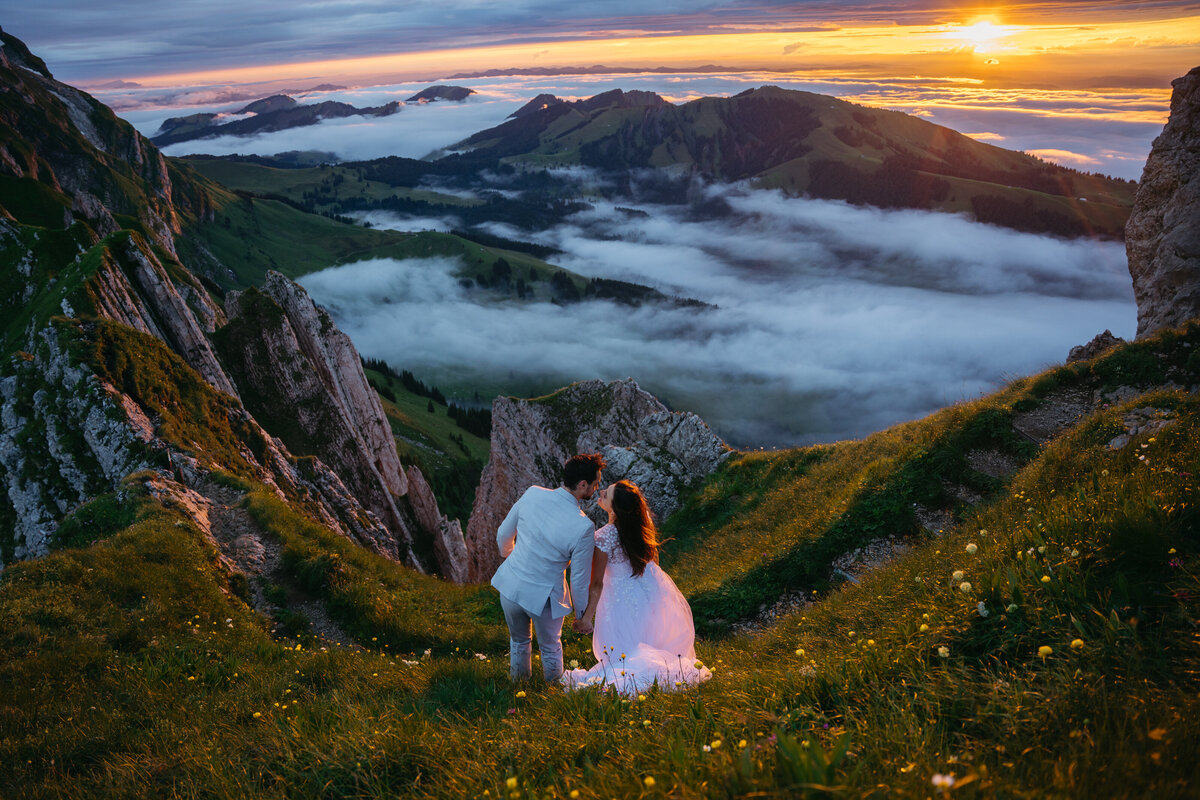 Crazy beautiful sunset happening with eloping couple in Appenzell Switzerland