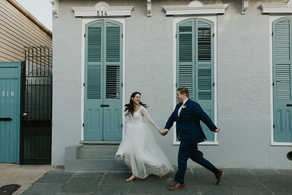 french-quarter-elopement-bride-groom-running