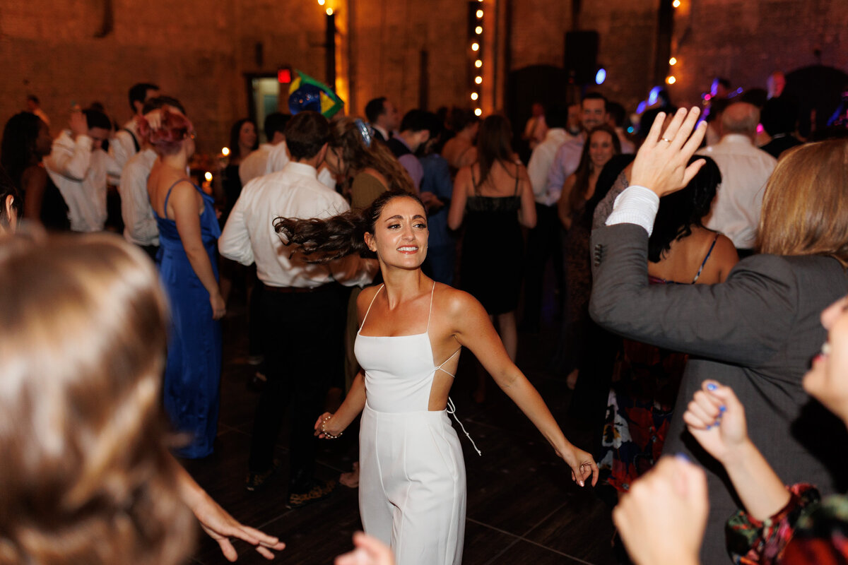 Industrial wedding reception dancing at Basilica Hudson in the Hudson Valley.

