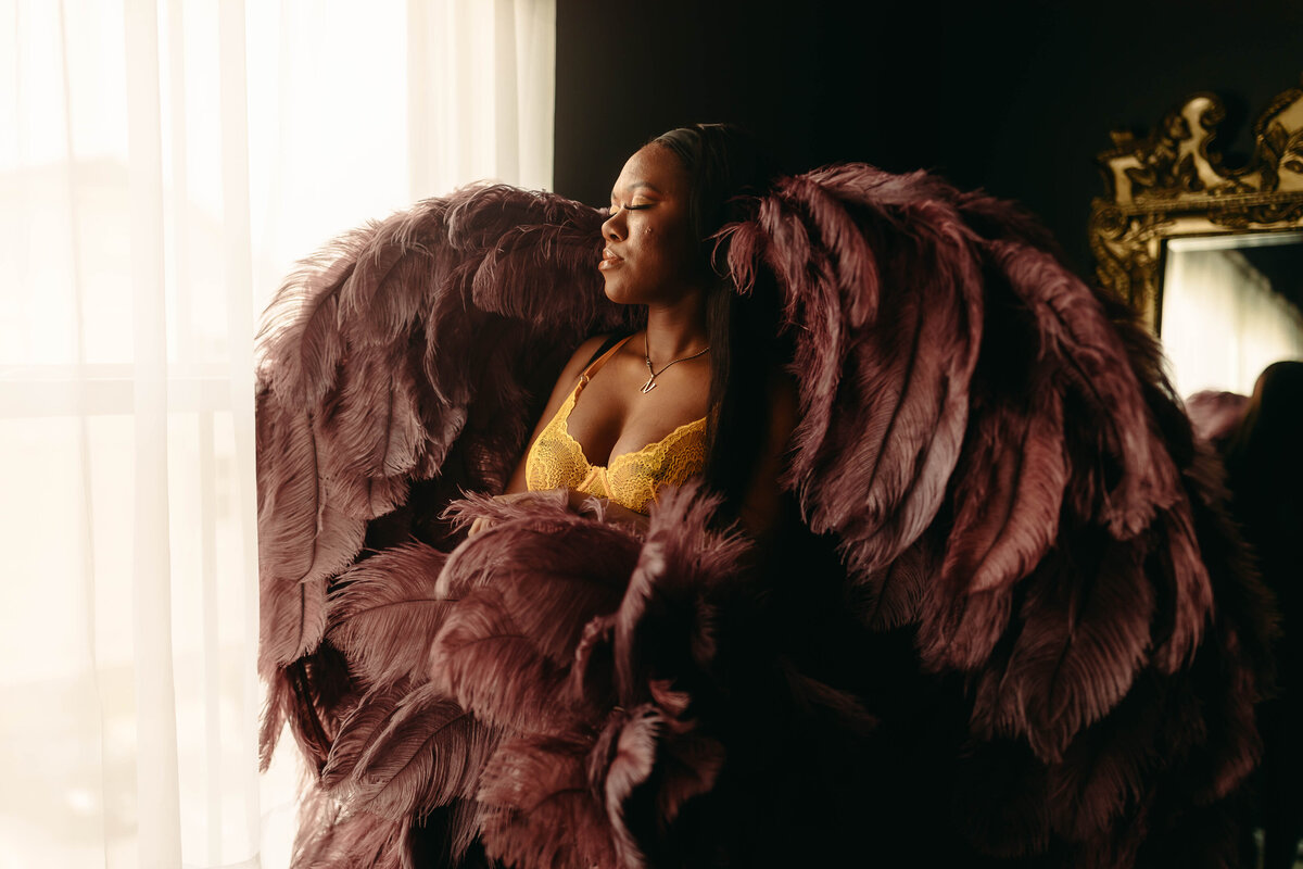 black woman in yellow lingerie and purple angel wings boudoir elkridge