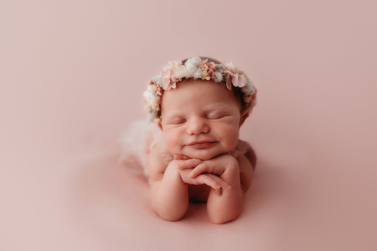 Infant posed for Newborn Photos in Asheville, NC.